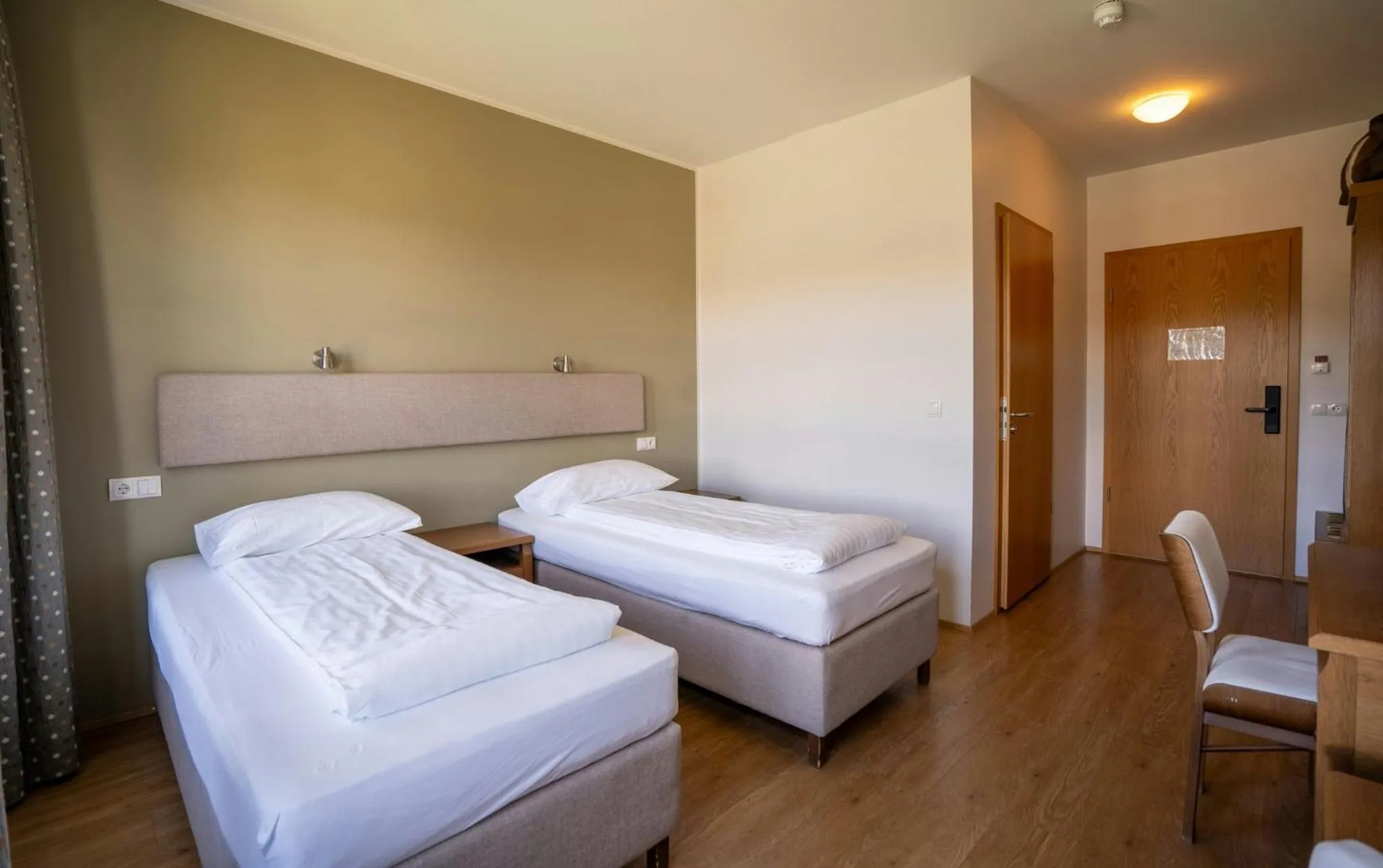 Bedroom, Bed in Gistihúsið - Lake Hotel Egilsstadir