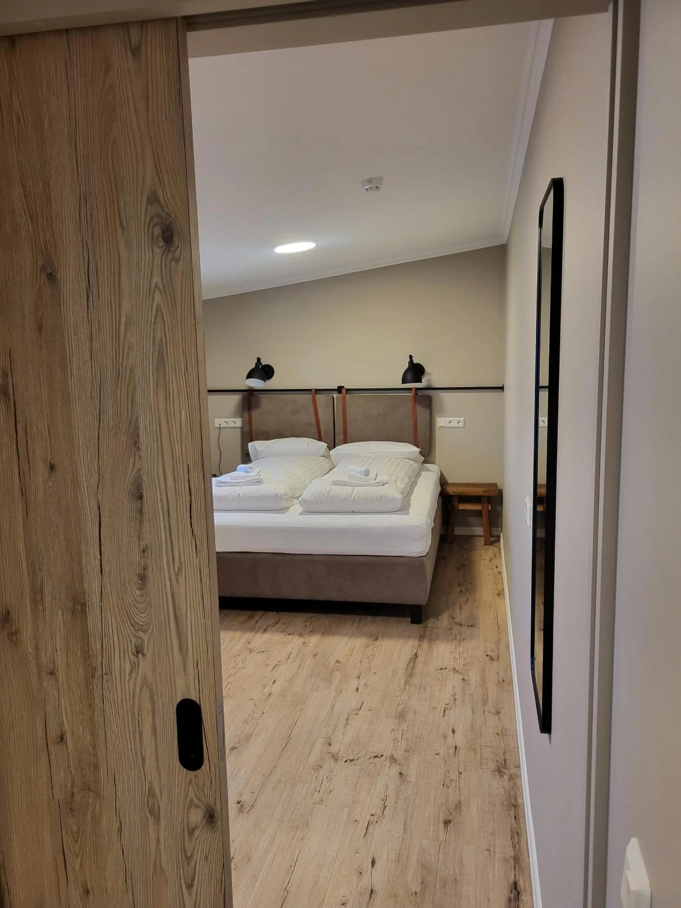 Bedroom, Bed in Gistihúsið - Lake Hotel Egilsstadir