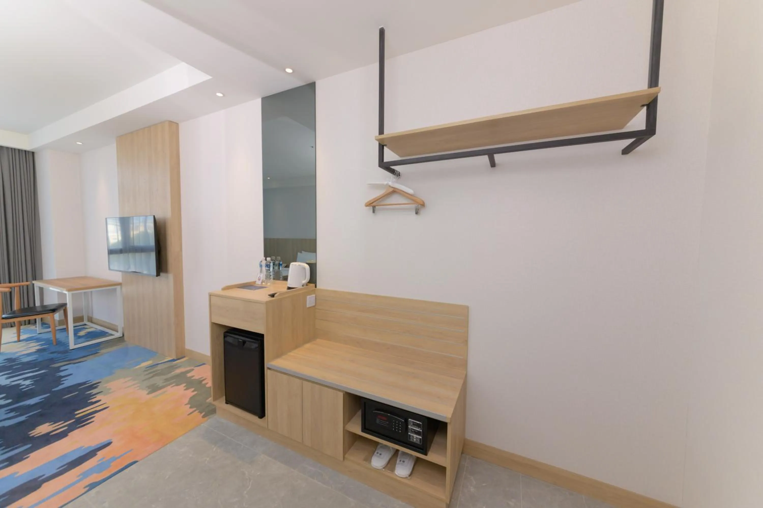 Seating area in JANDA Golden Tulip Hotel