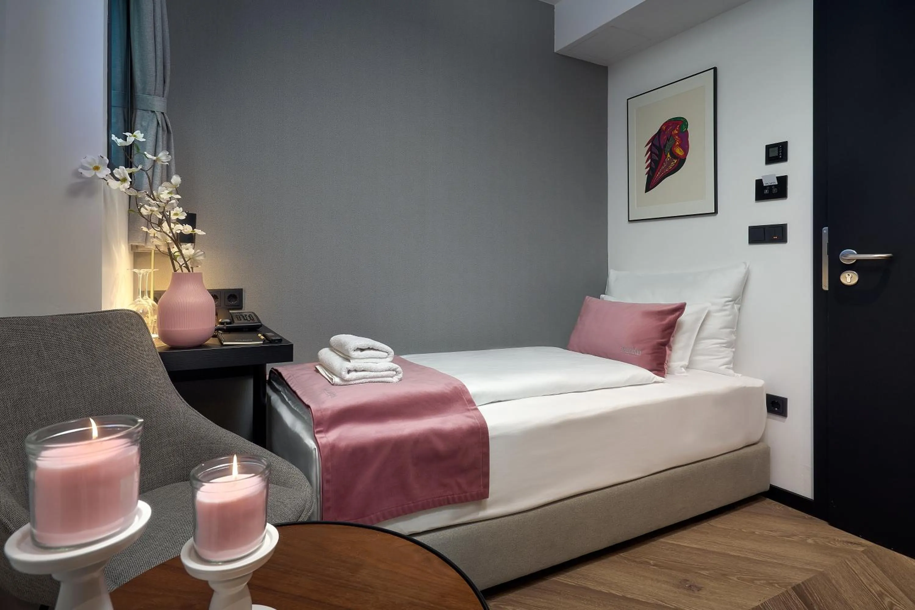 Bed in The Hotel Ljubljana