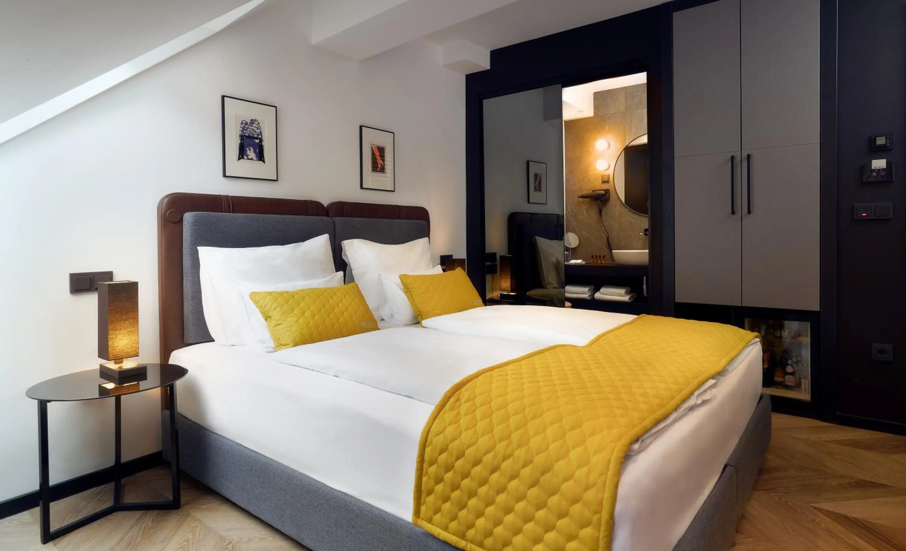 Bed in The Hotel Ljubljana