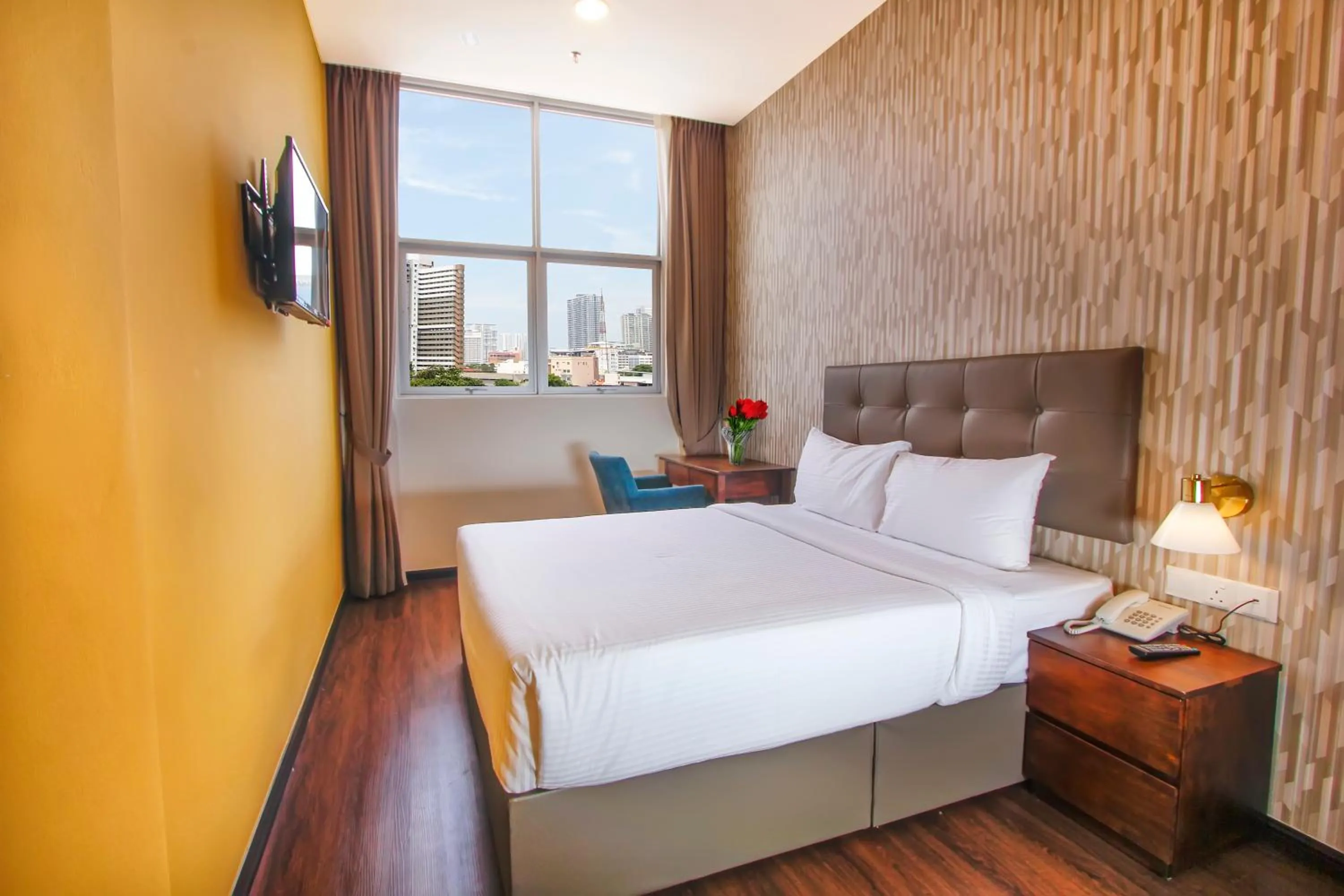 Bed in CitiVilla Hotel Penang