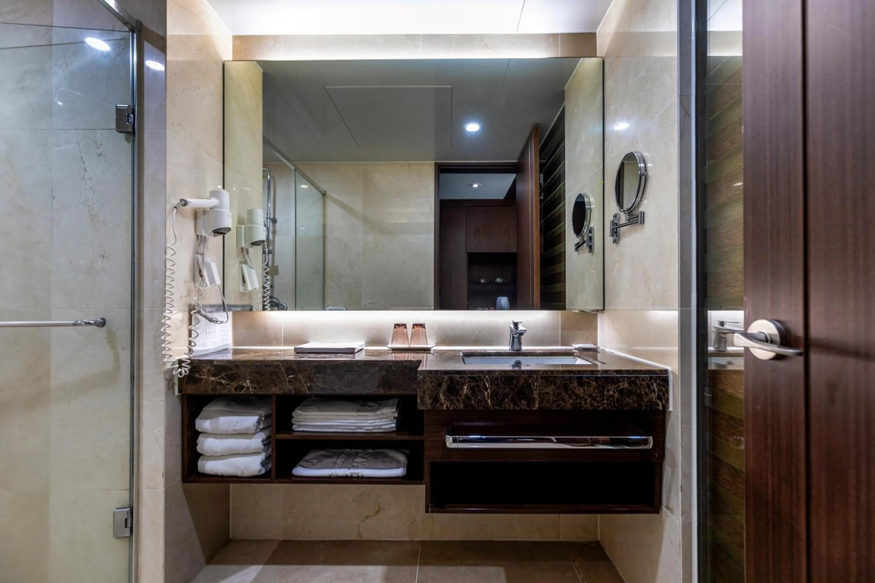 Bathroom in Ramada by Wyndham Jeju Hamdeok