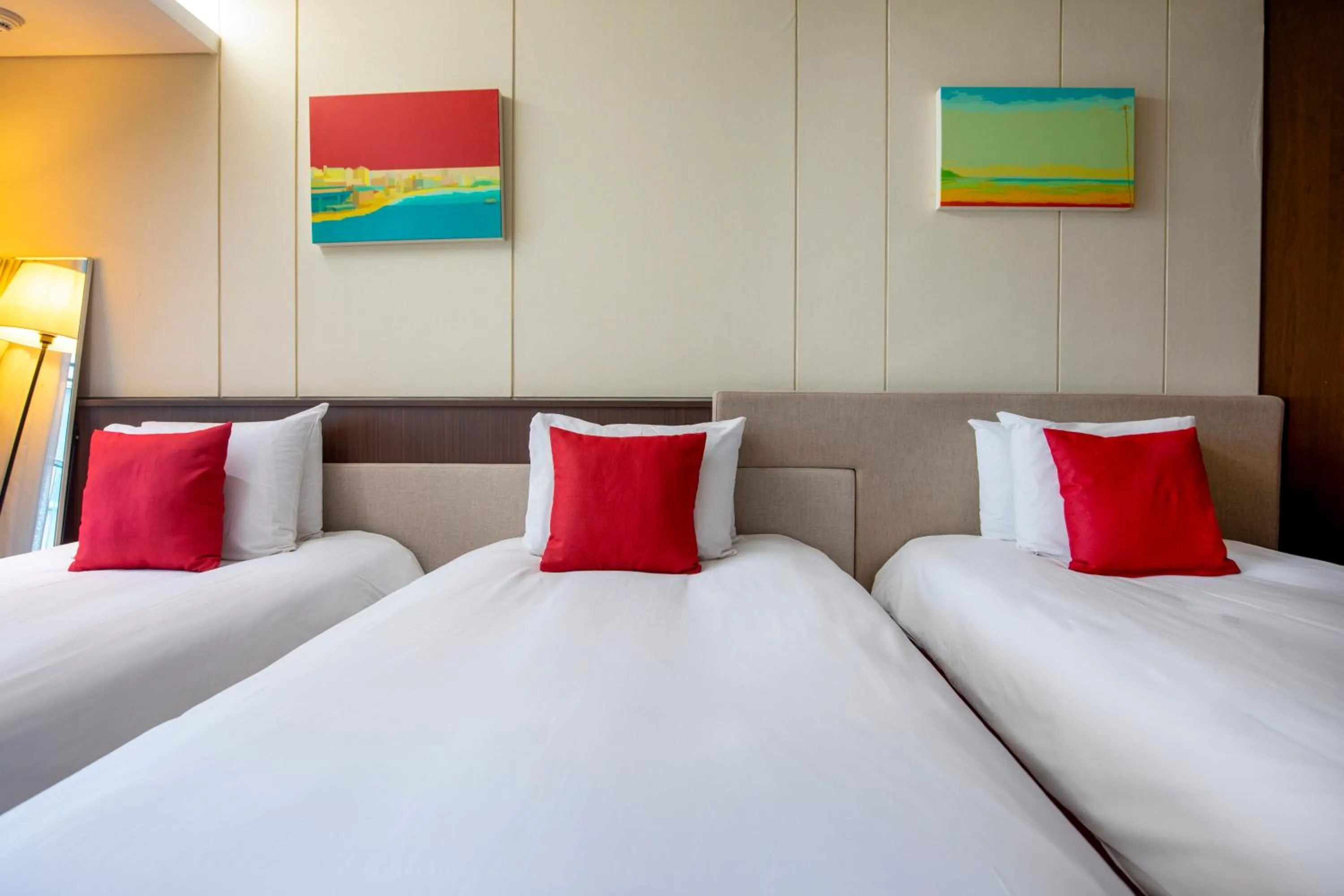 Bed in Ramada by Wyndham Jeju Hamdeok