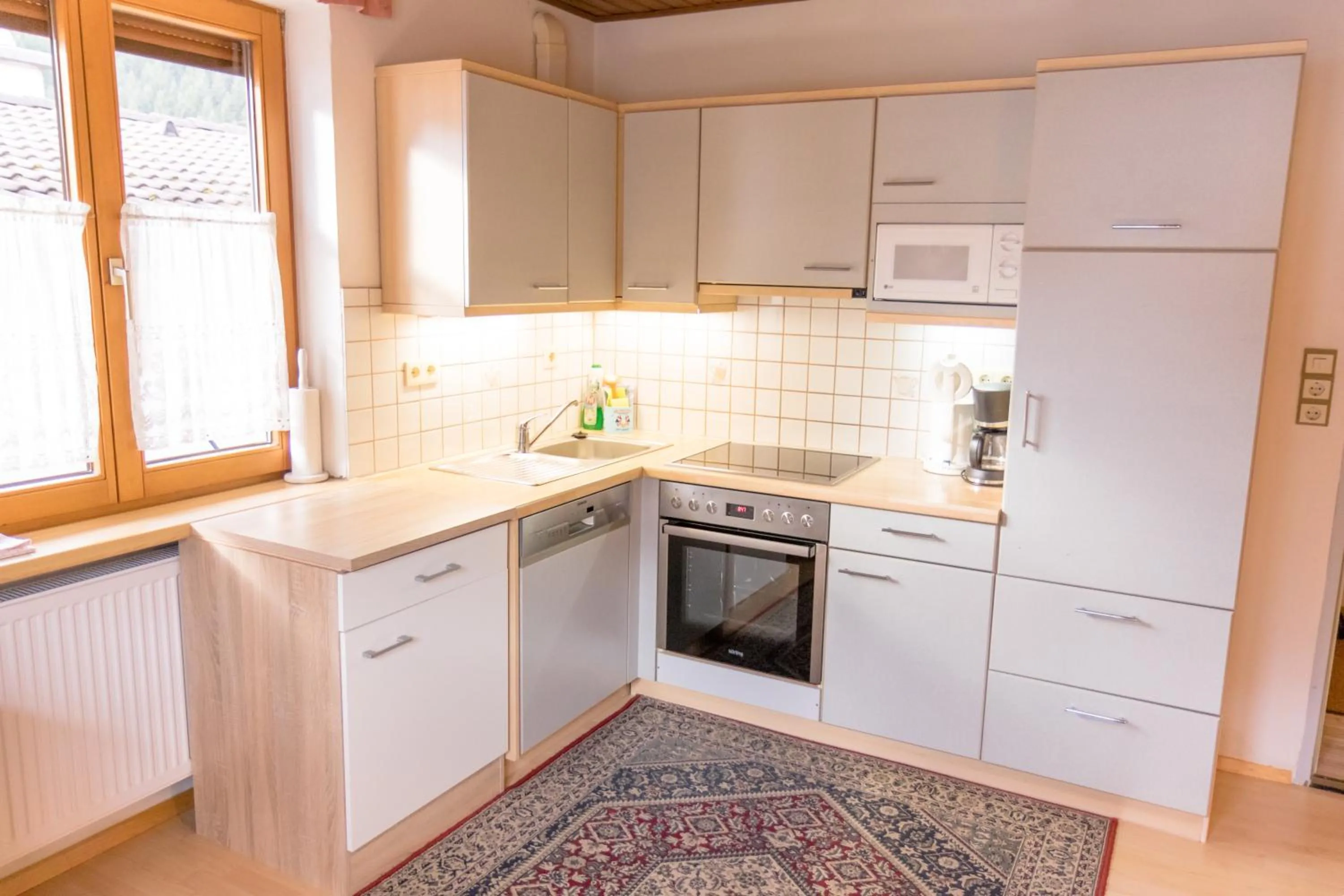 Kitchen or kitchenette in Landhaus Alpenrose