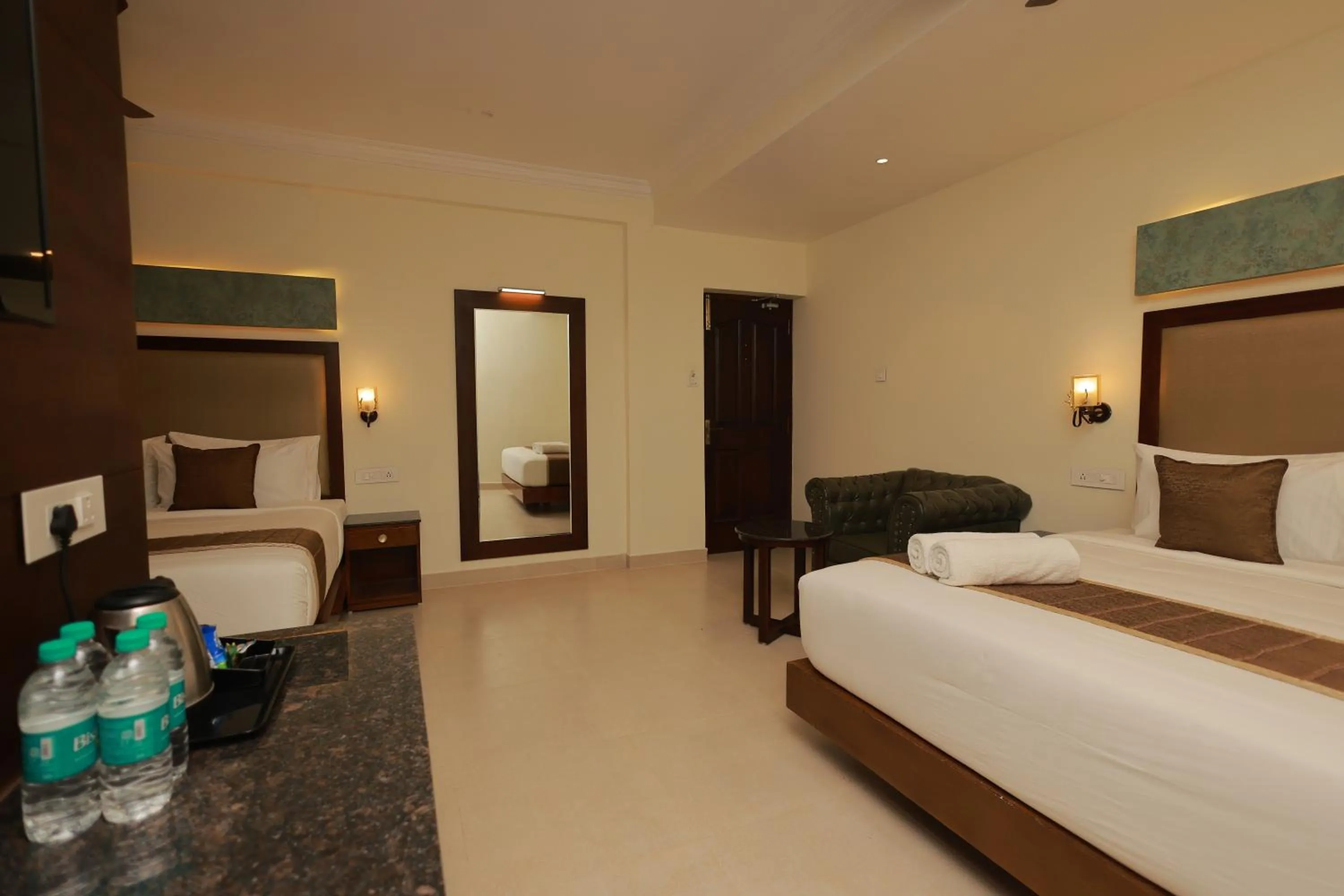 Bed in Hotel Comorin Grand