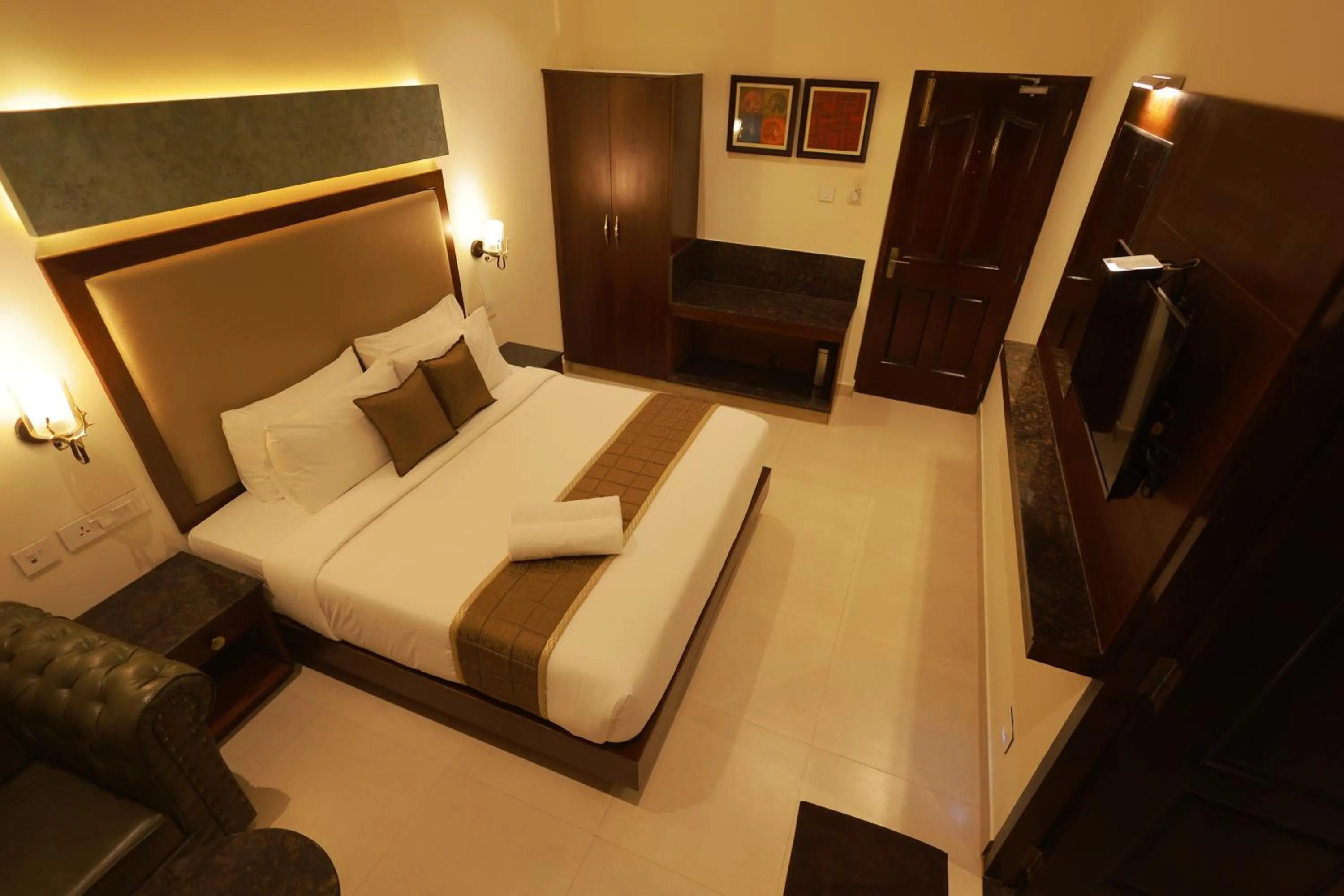 Bed in Hotel Comorin Grand