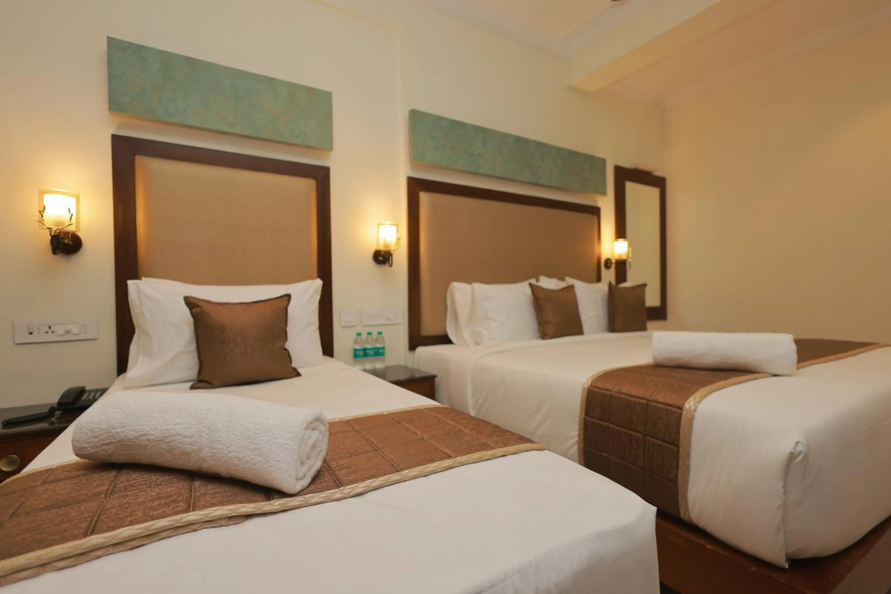 Bed in Hotel Comorin Grand