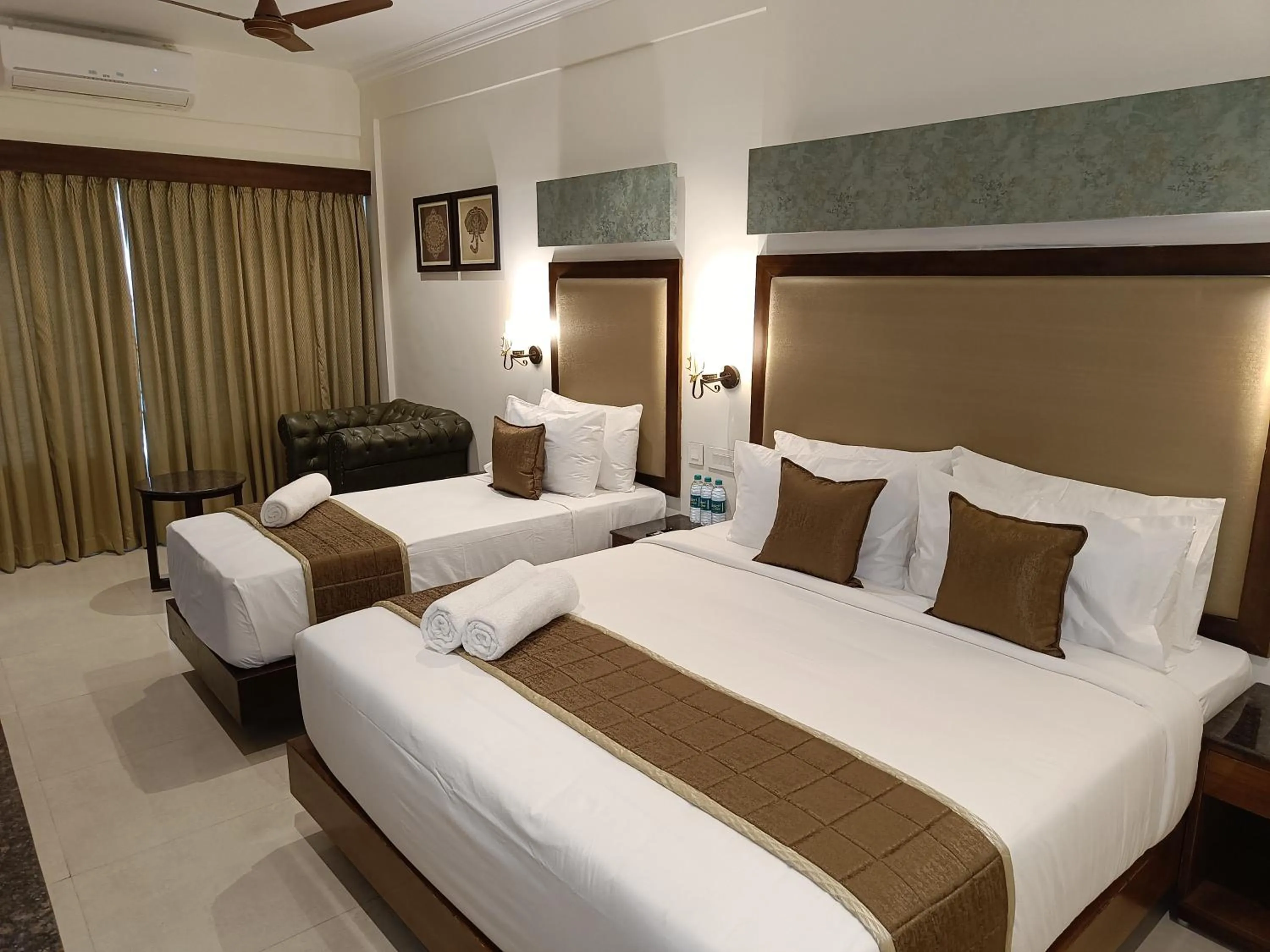 Bed in Hotel Comorin Grand