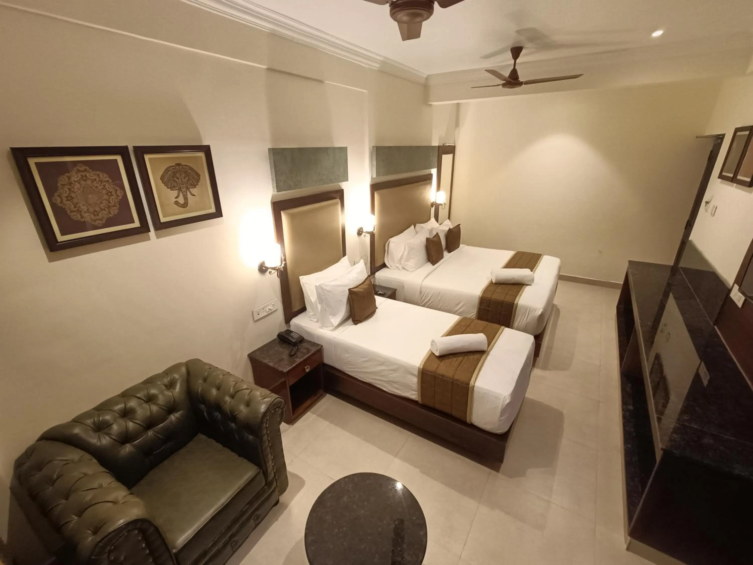 Bed in Hotel Comorin Grand