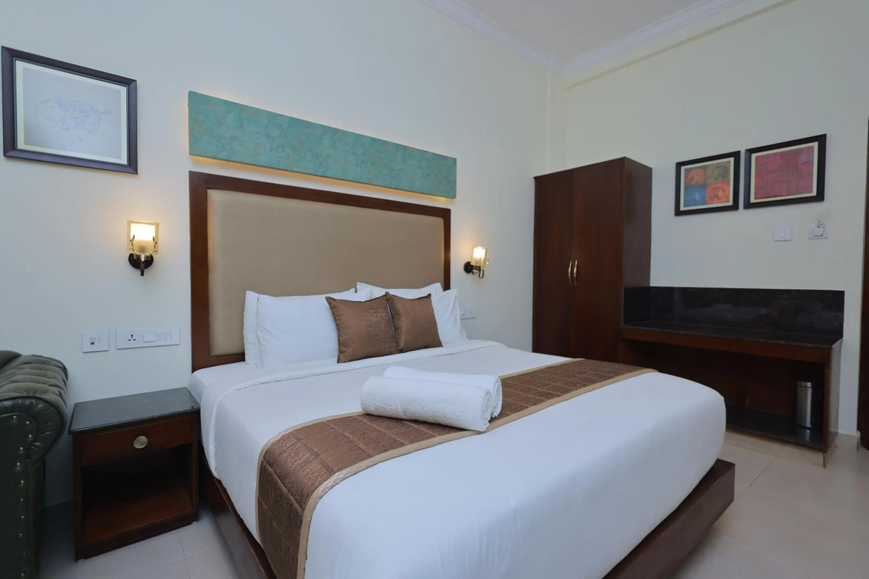 Bed in Hotel Comorin Grand