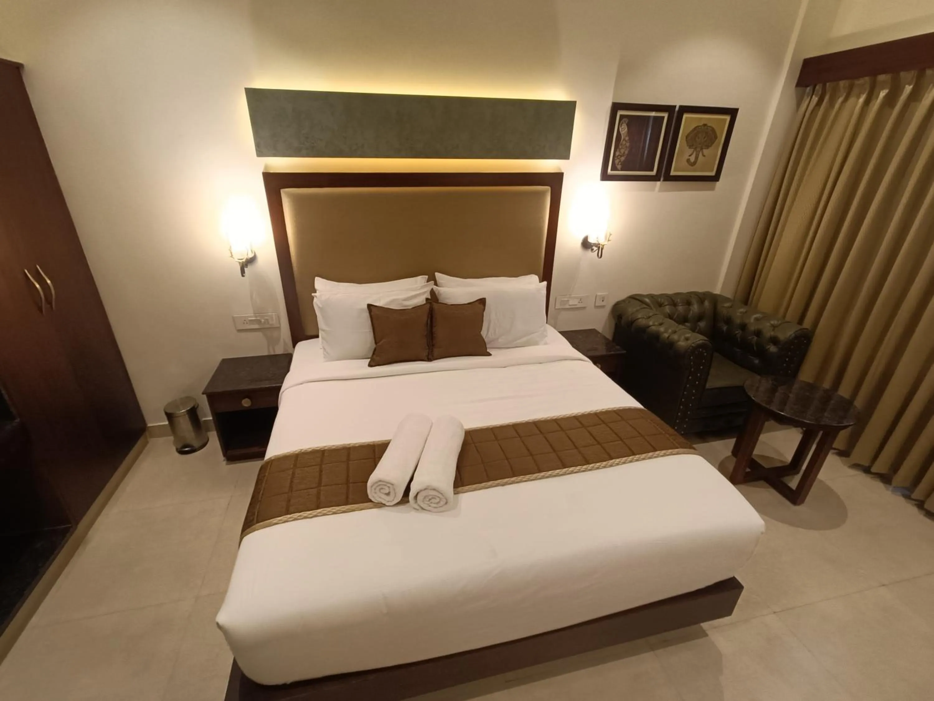 Bed in Hotel Comorin Grand