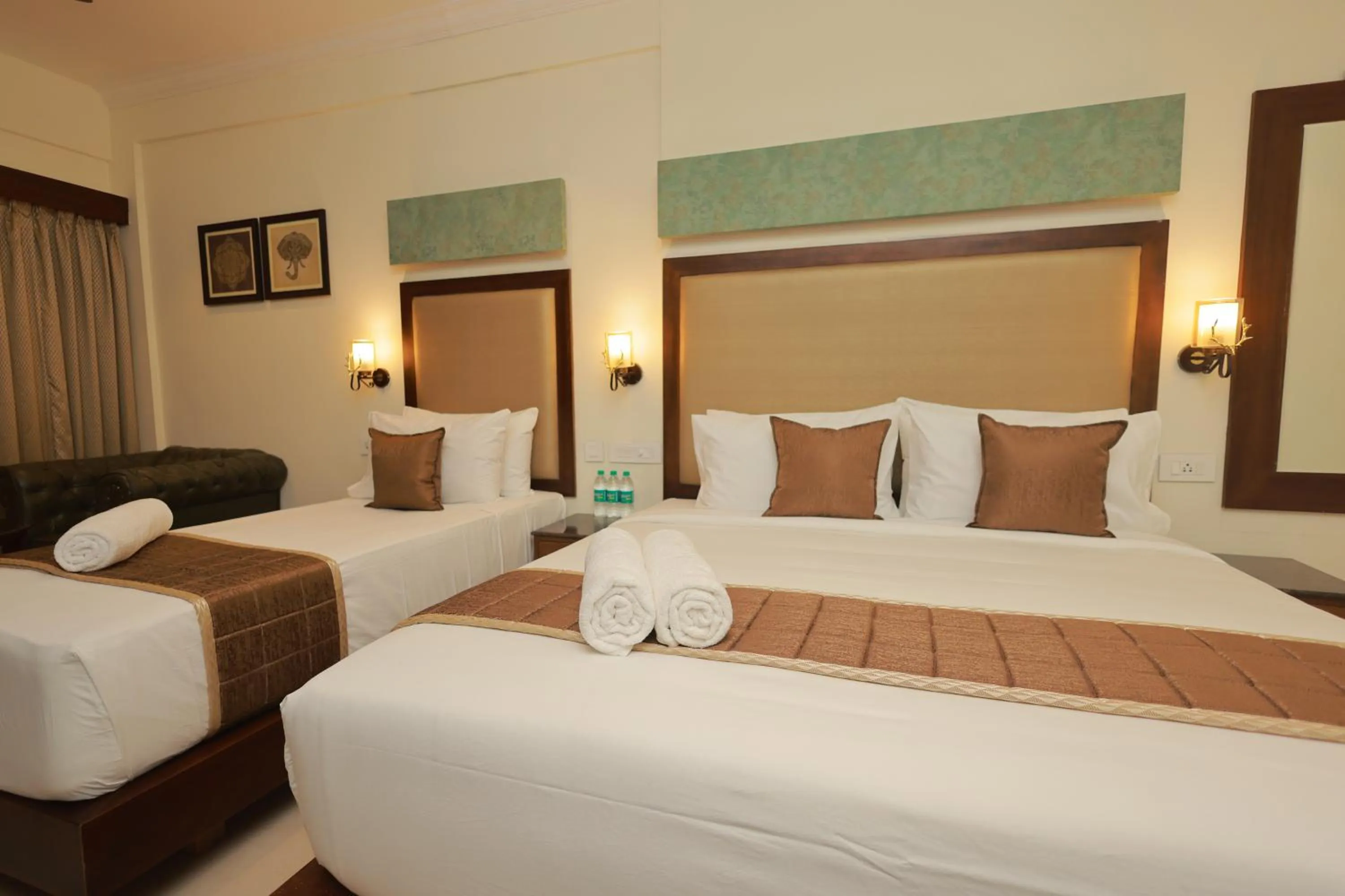 Bed in Hotel Comorin Grand
