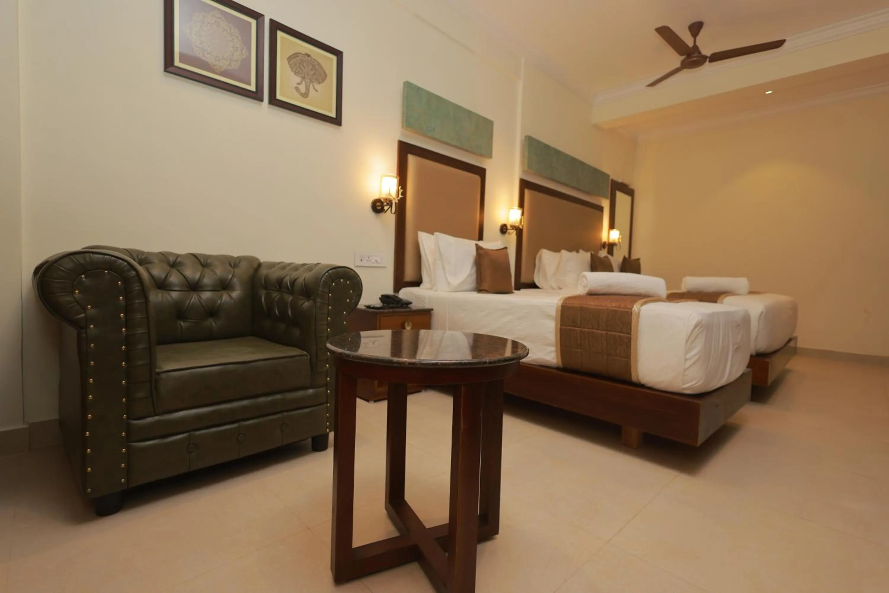 Bed in Hotel Comorin Grand