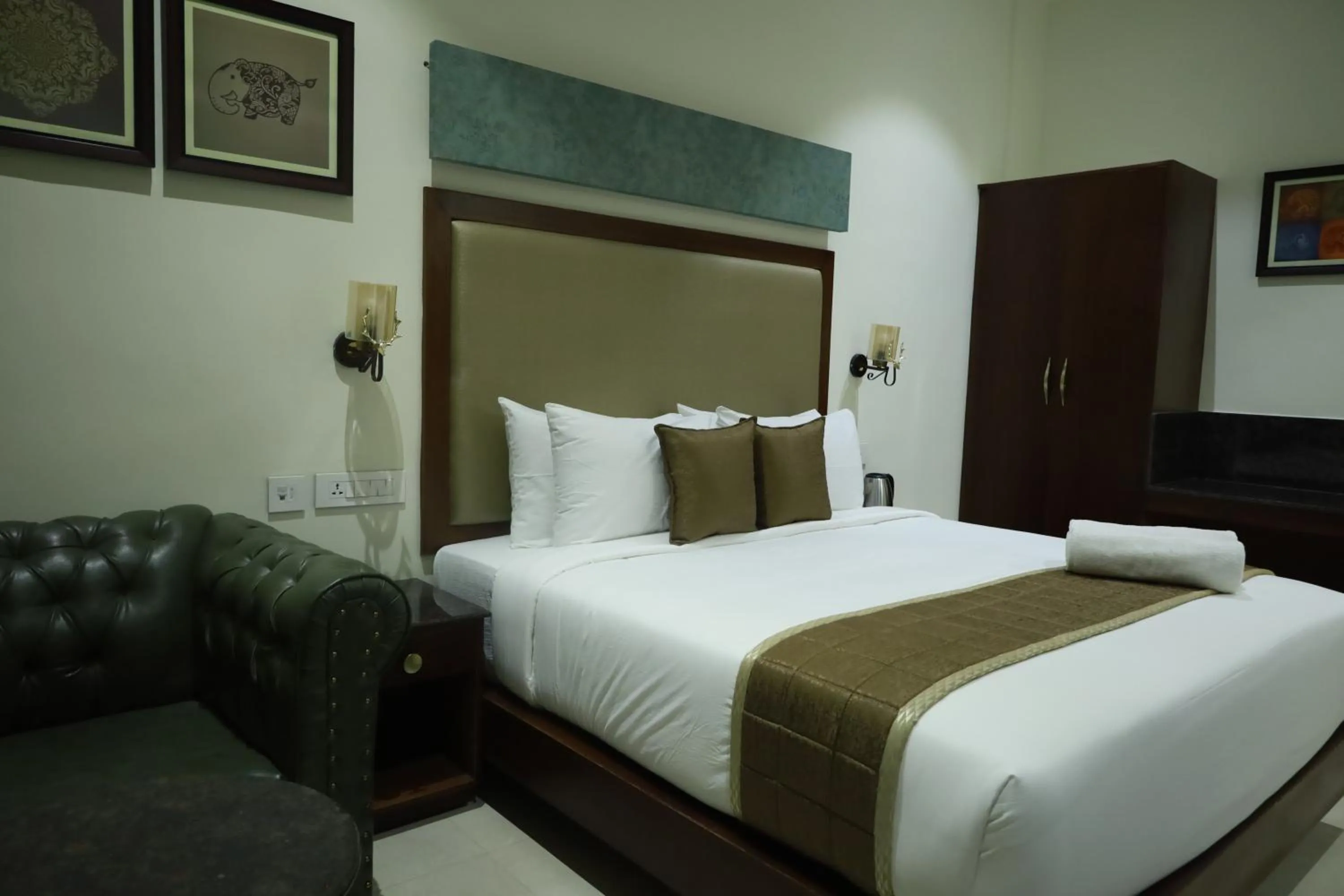 Bed in Hotel Comorin Grand
