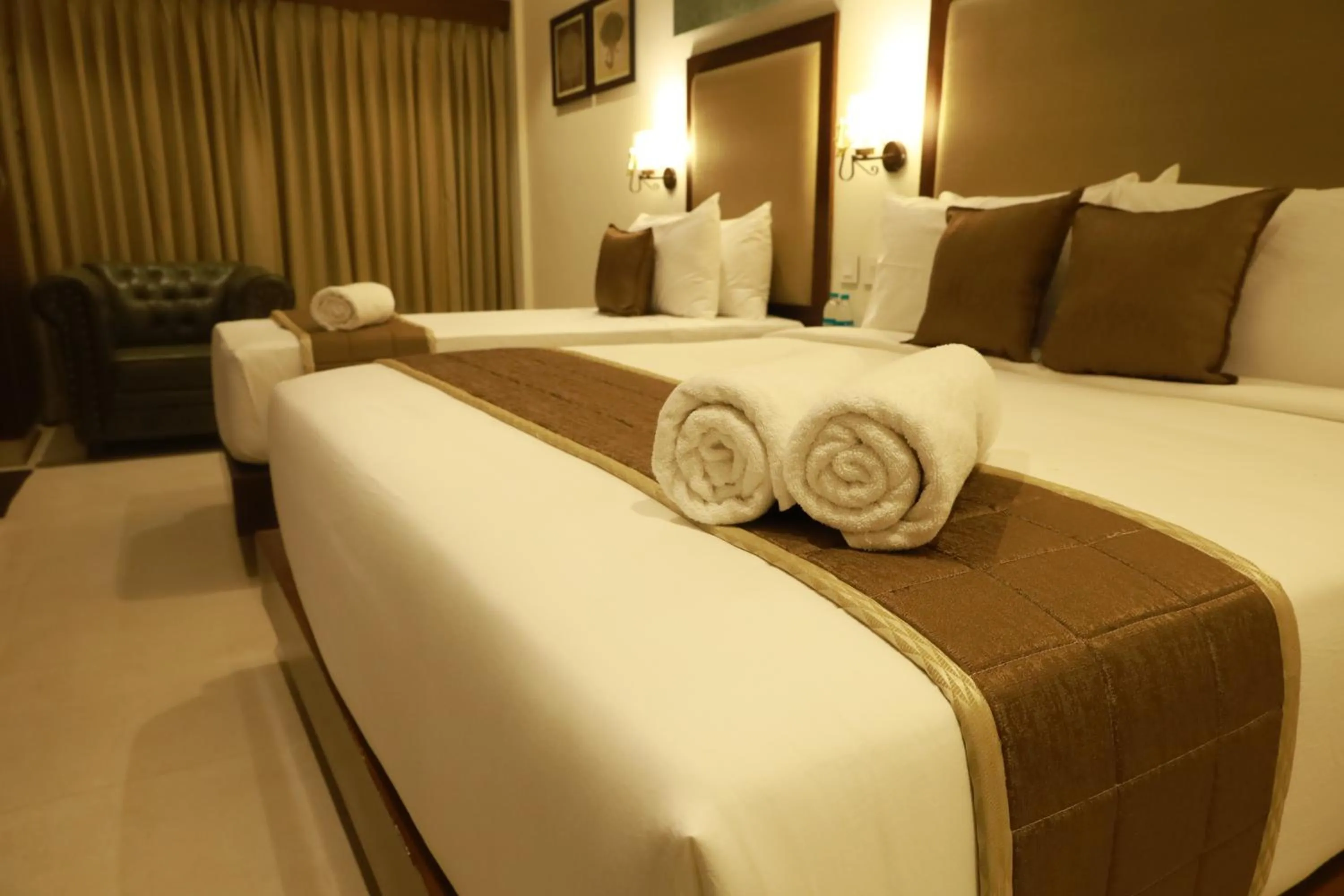 Bed in Hotel Comorin Grand