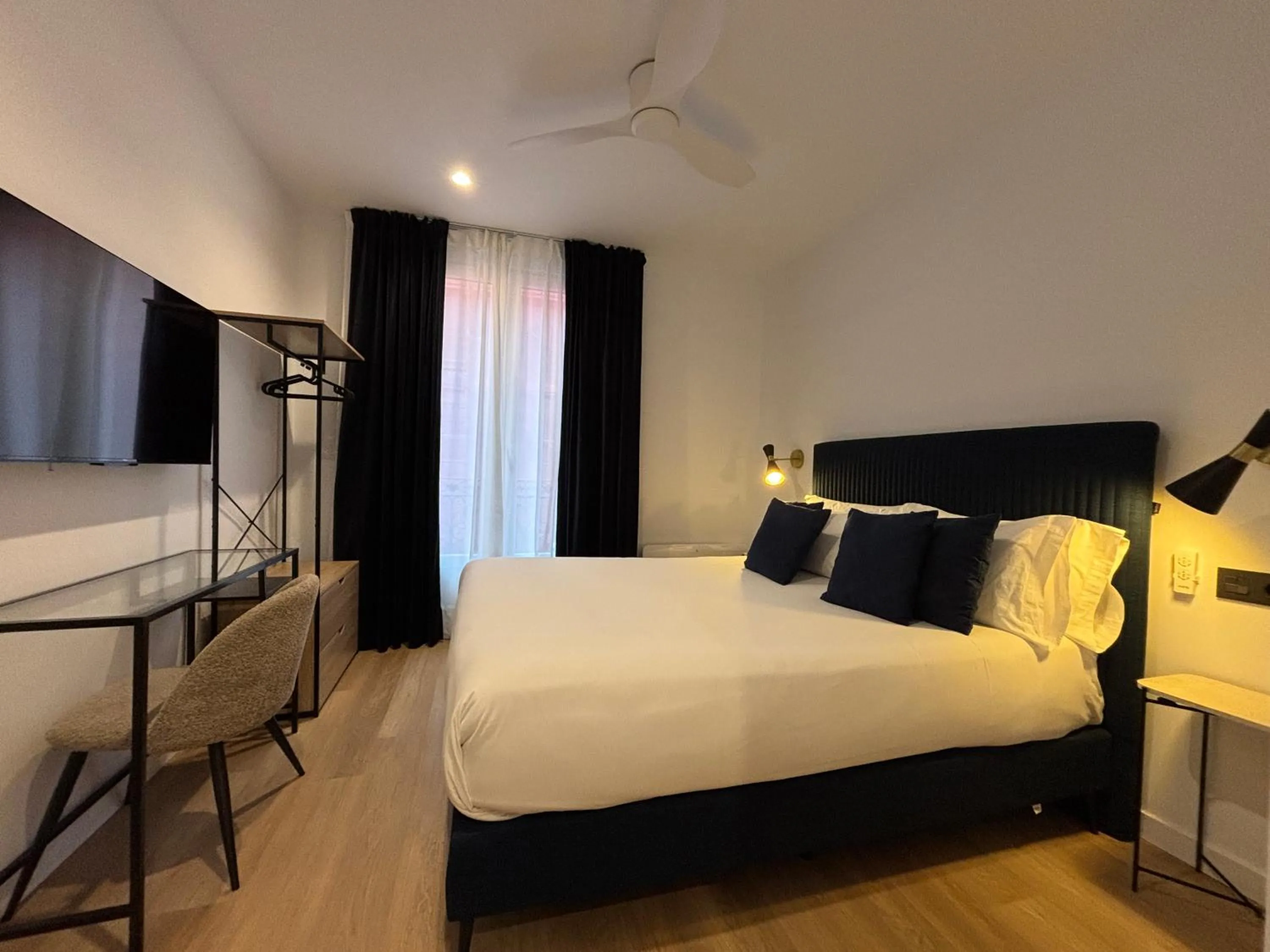 Photo of the whole room, Bed in Arenal Suites Bilbao