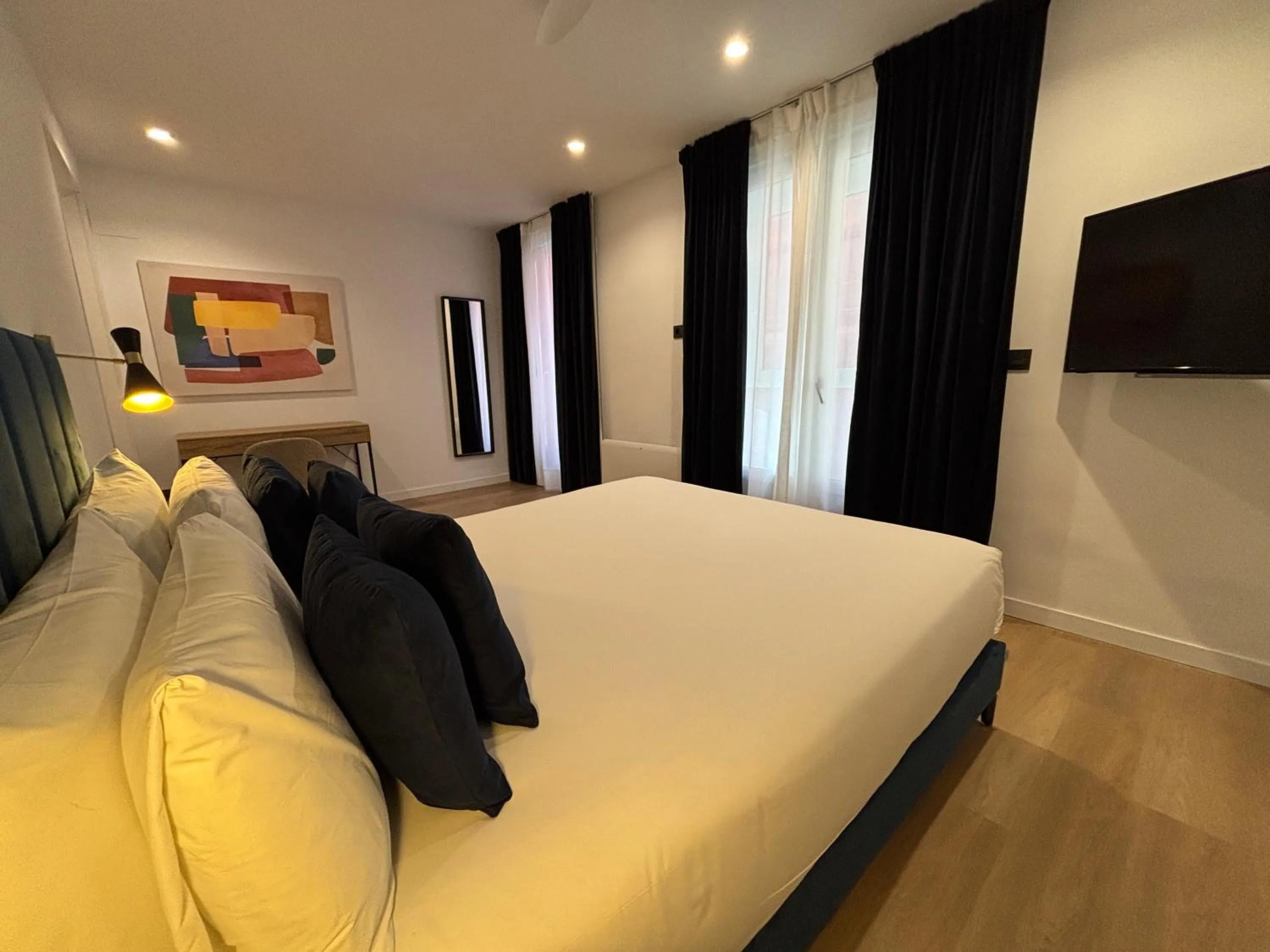 Photo of the whole room, Bed in Arenal Suites Bilbao