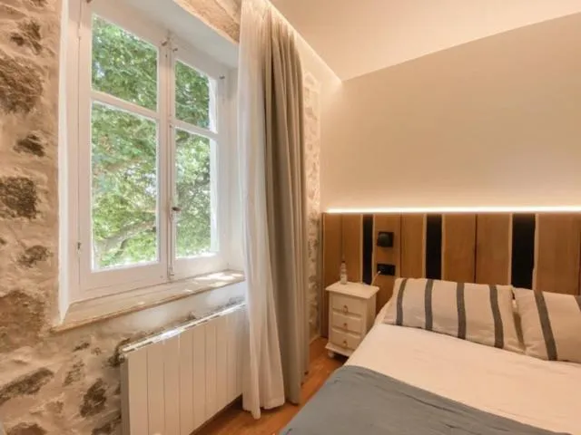 Bed in Hotel Arimune