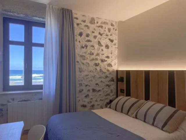 Bed in Hotel Arimune