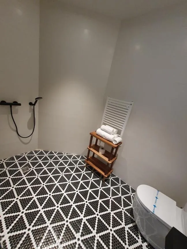 Facility for disabled guests, Bed in Hotel Arimune