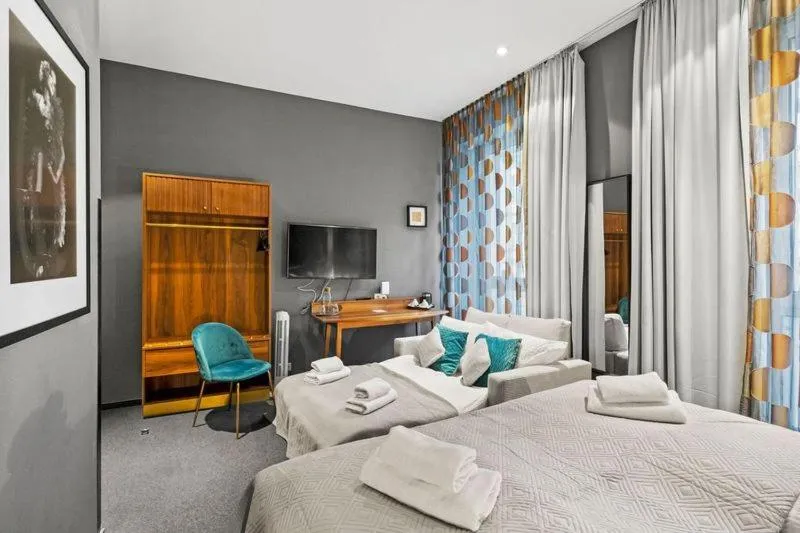 Bed in Hotel George Vienna