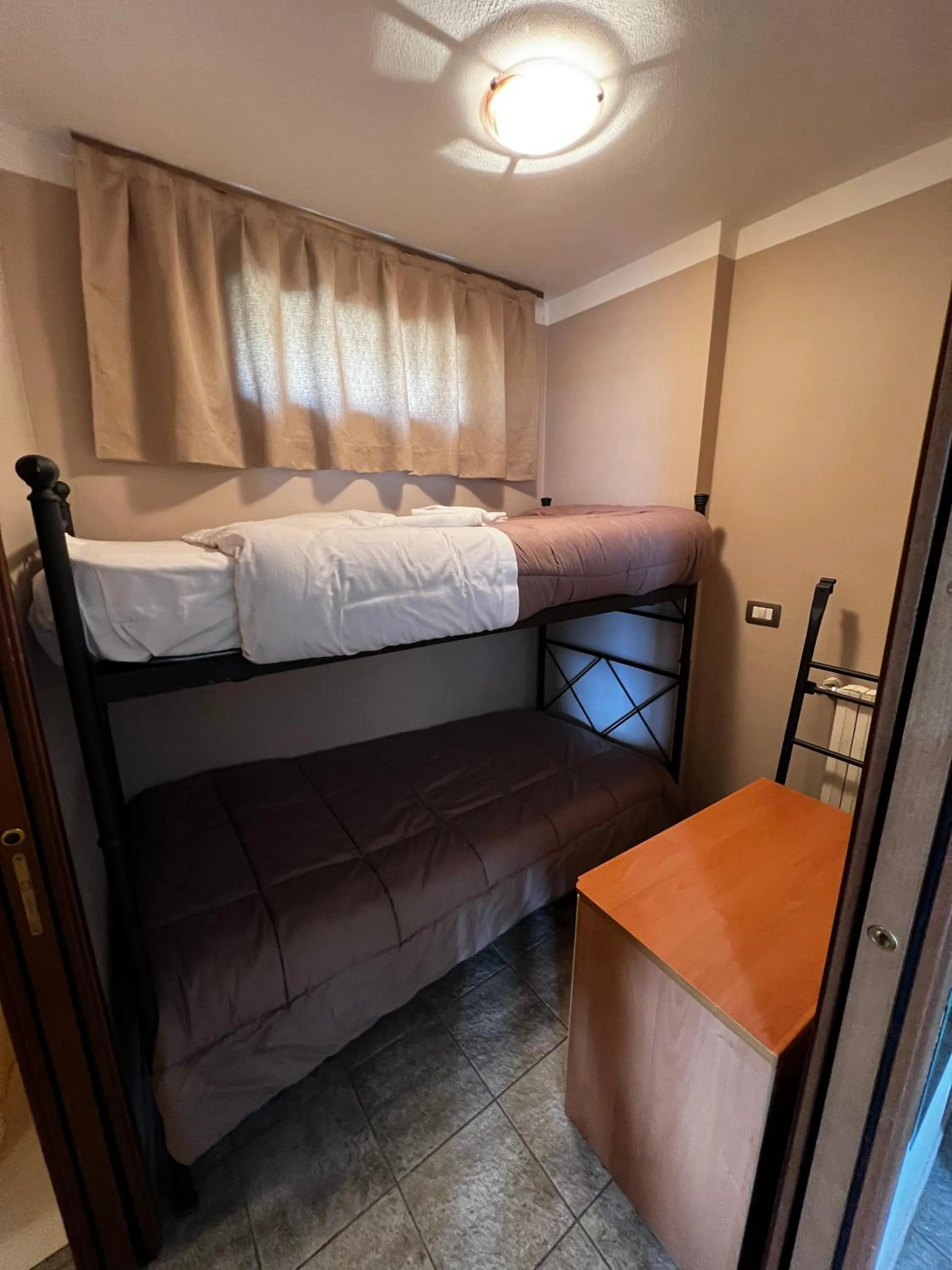 Bed in Chalet Edelweiss - Estella Hotel Collection