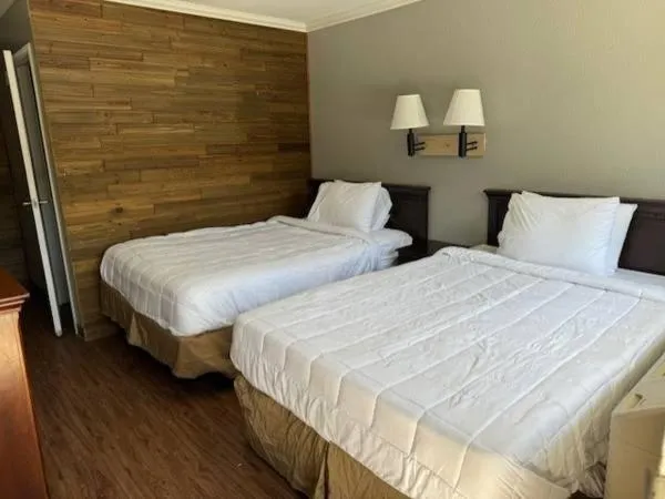 Bed in FairBridge Inn & Suites Richmond Hill