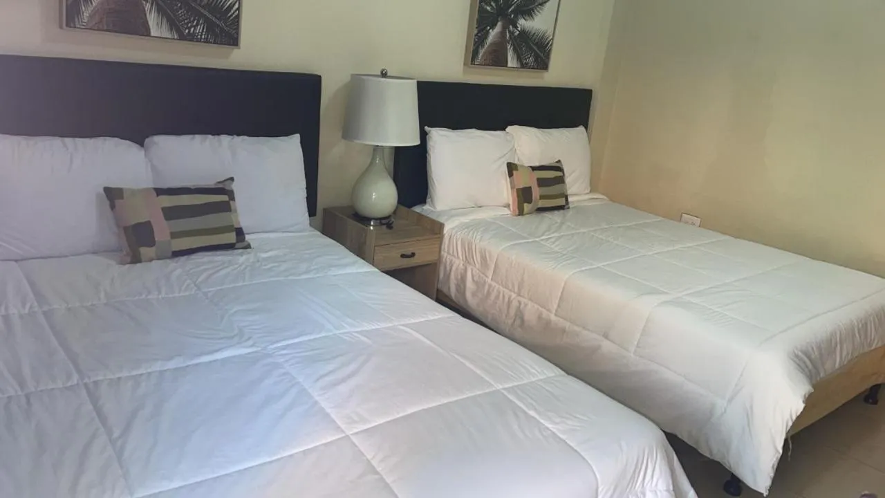 Bed in Sambo Mambo Beach Hotel