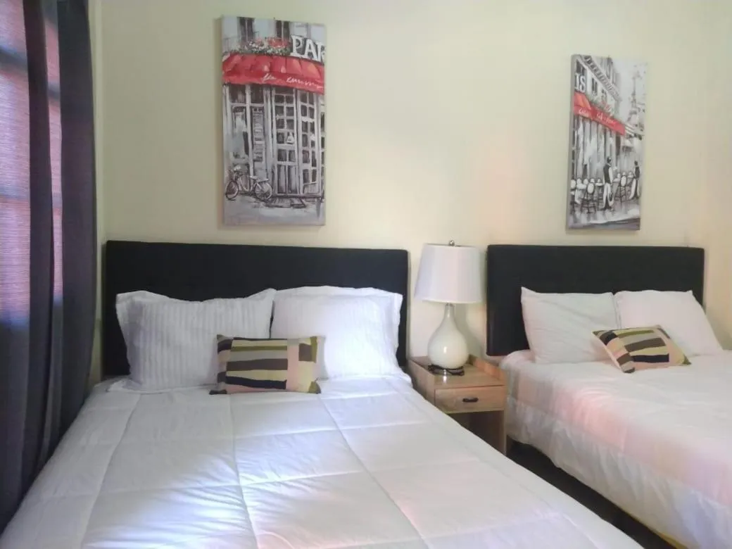 Bed in Sambo Mambo Beach Hotel