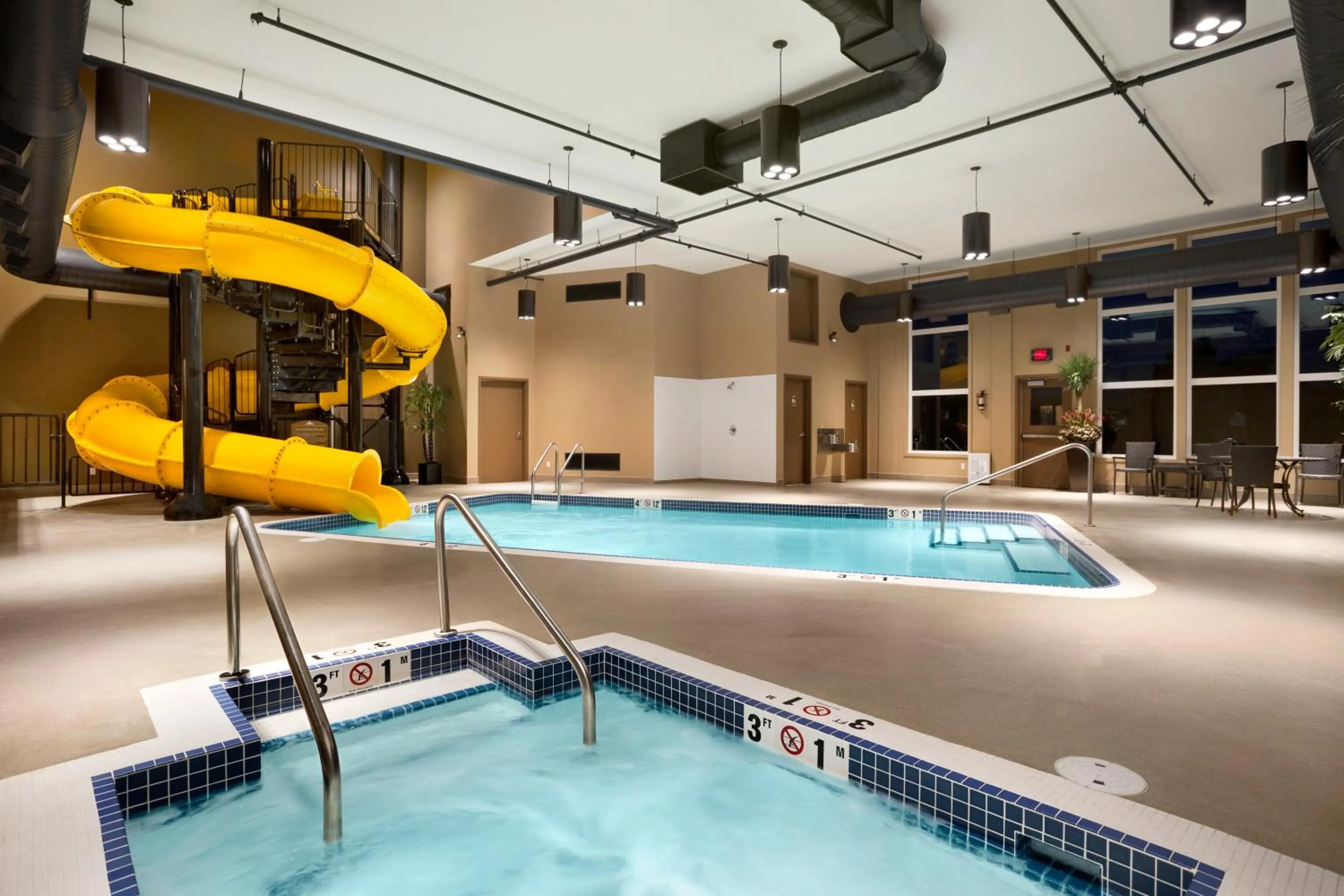 Swimming pool in Microtel Inn & Suites by Wyndham Lloydminster