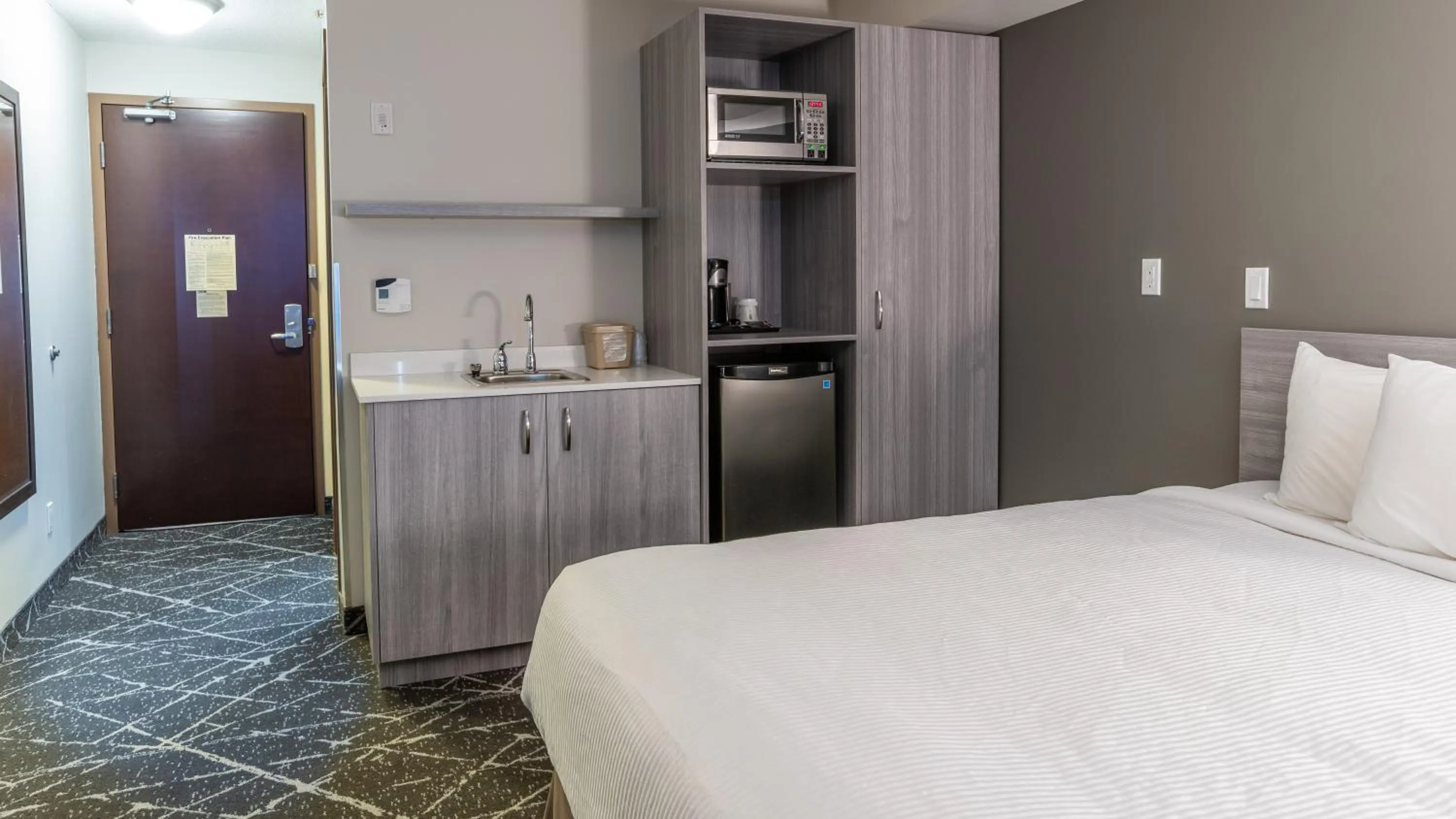 Photo of the whole room, Bed in Microtel Inn & Suites by Wyndham Lloydminster