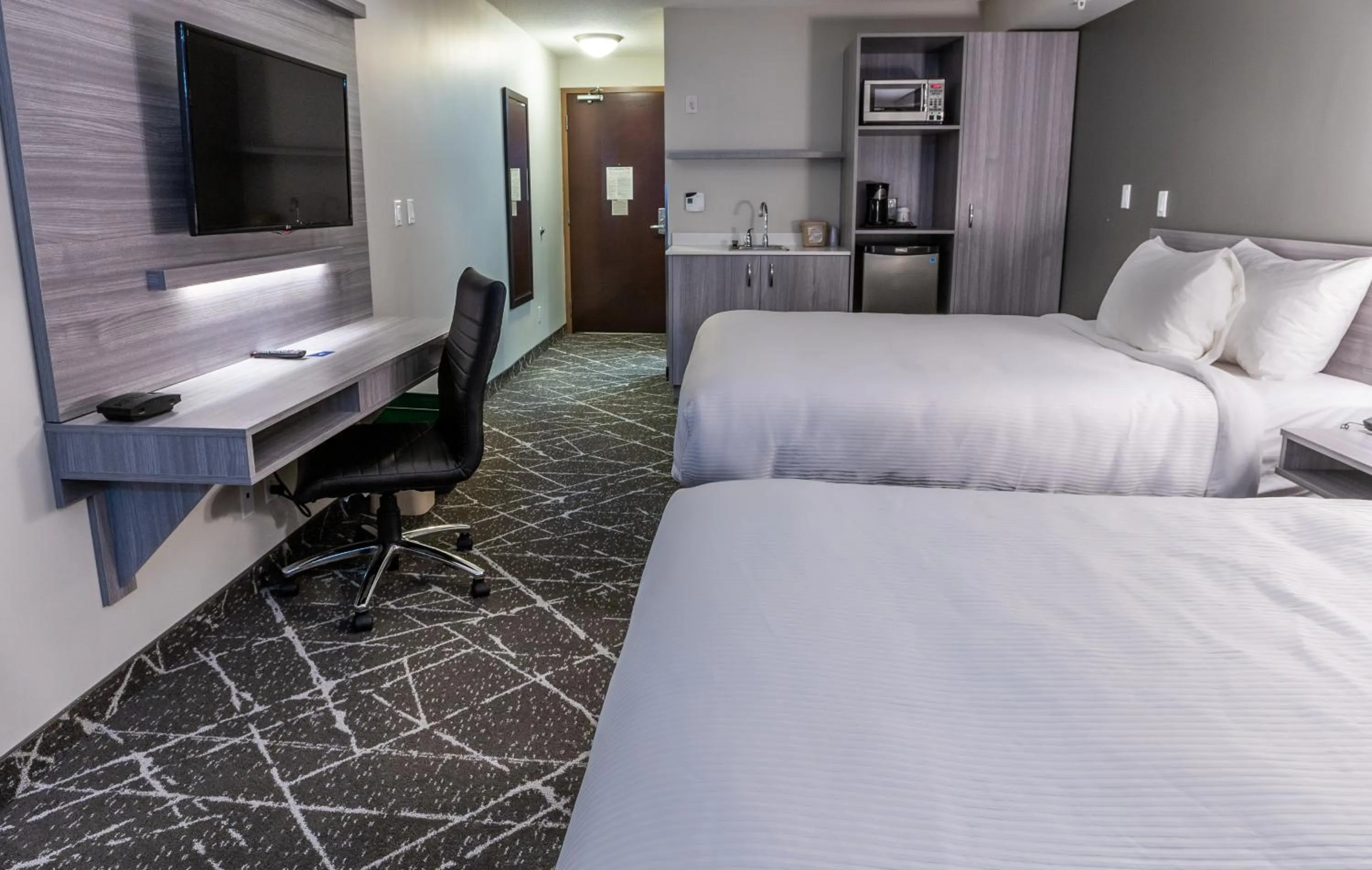 Bed in Microtel Inn & Suites by Wyndham Lloydminster