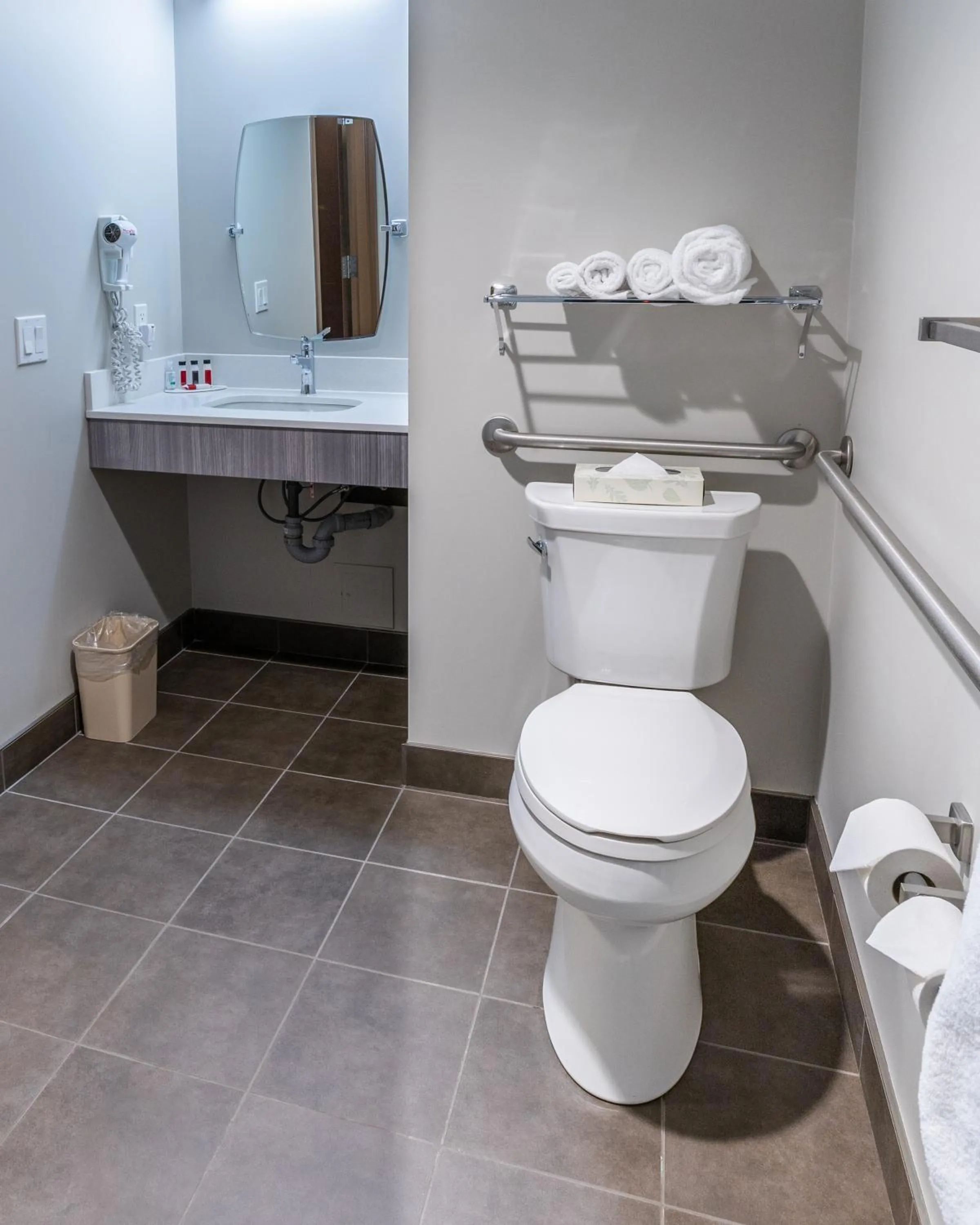 Toilet in Microtel Inn & Suites by Wyndham Lloydminster