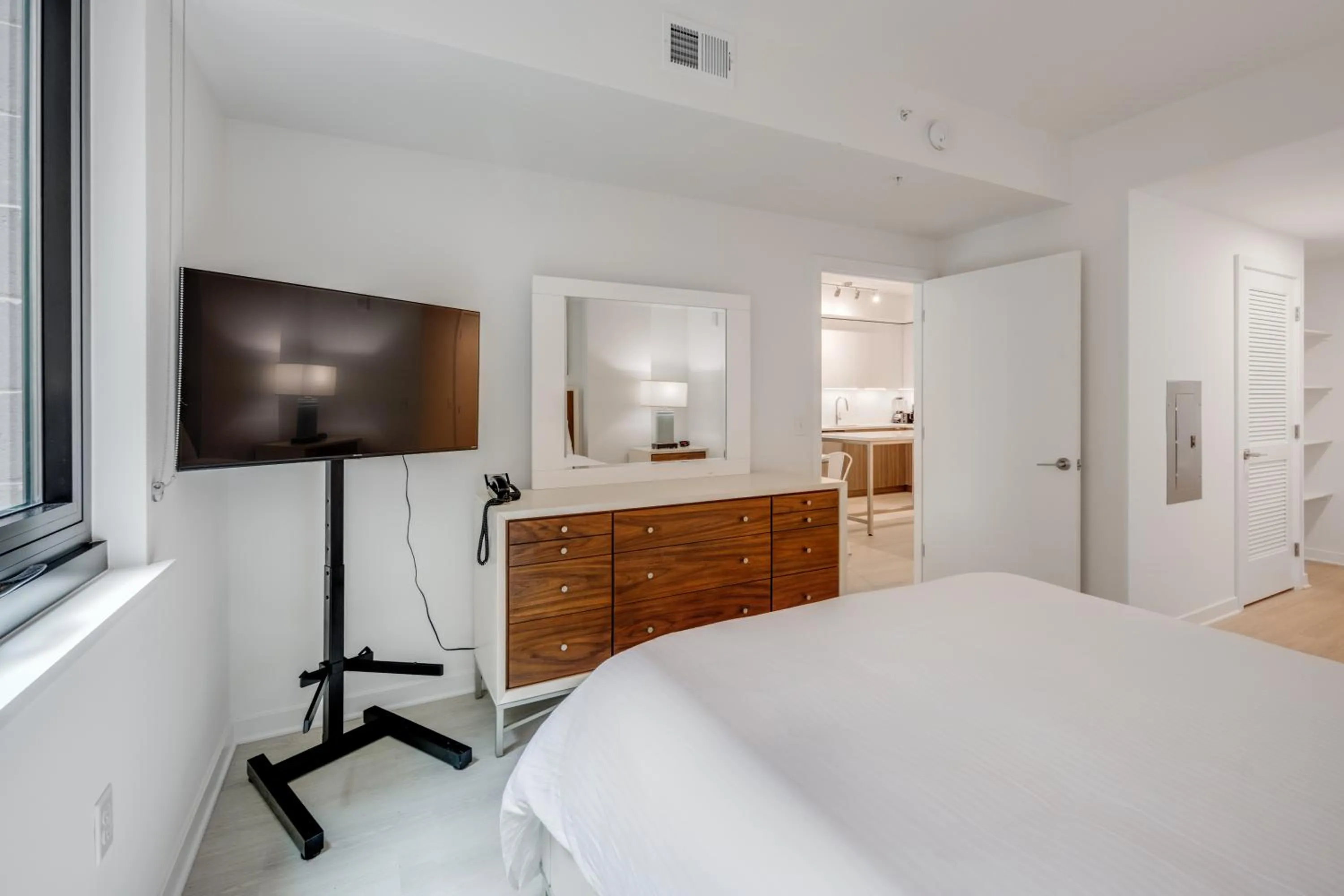 Bed in Global Luxury Suites at Capitol Hill