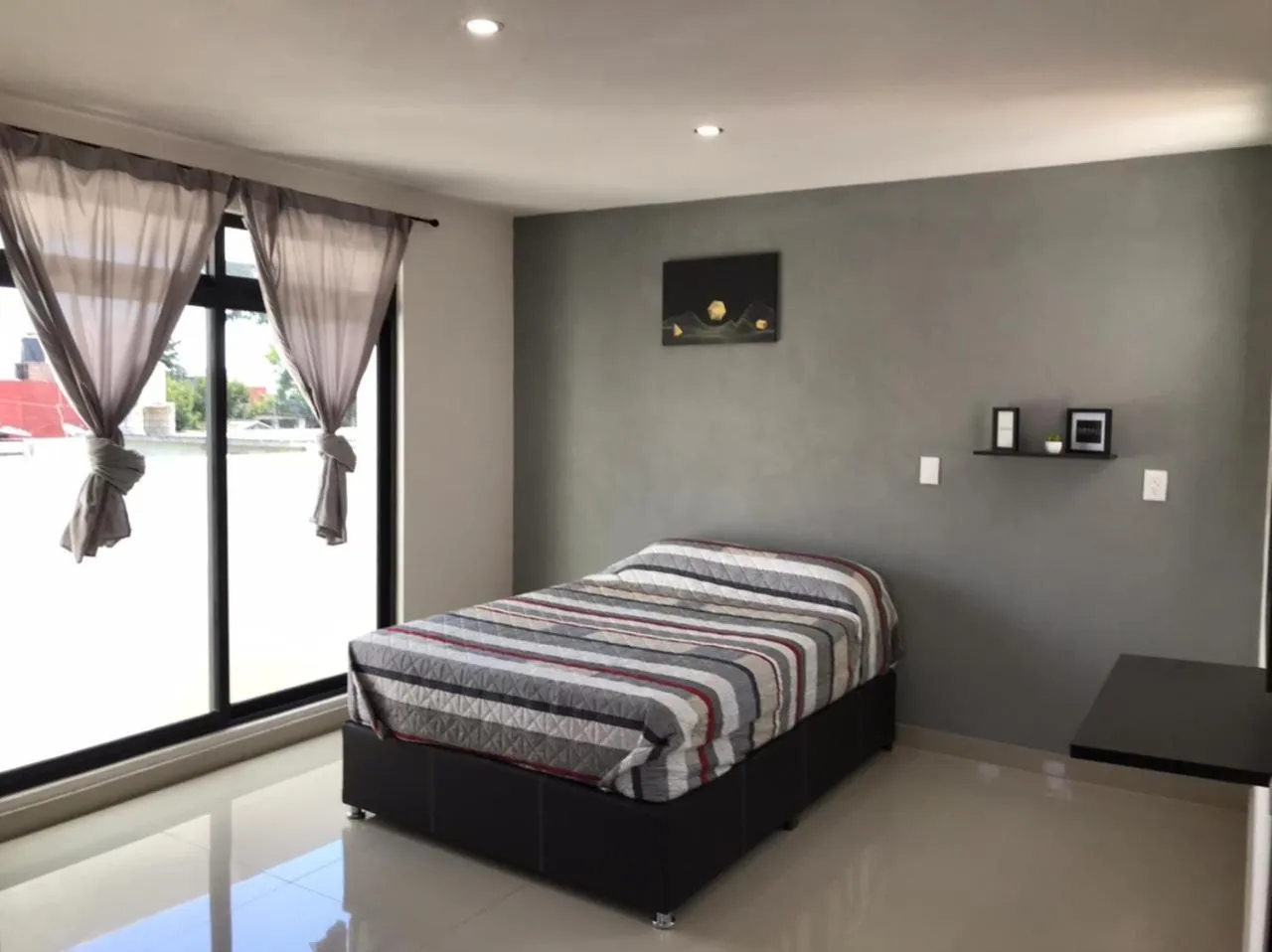 Bed in HOTEL NUEVA LUNA