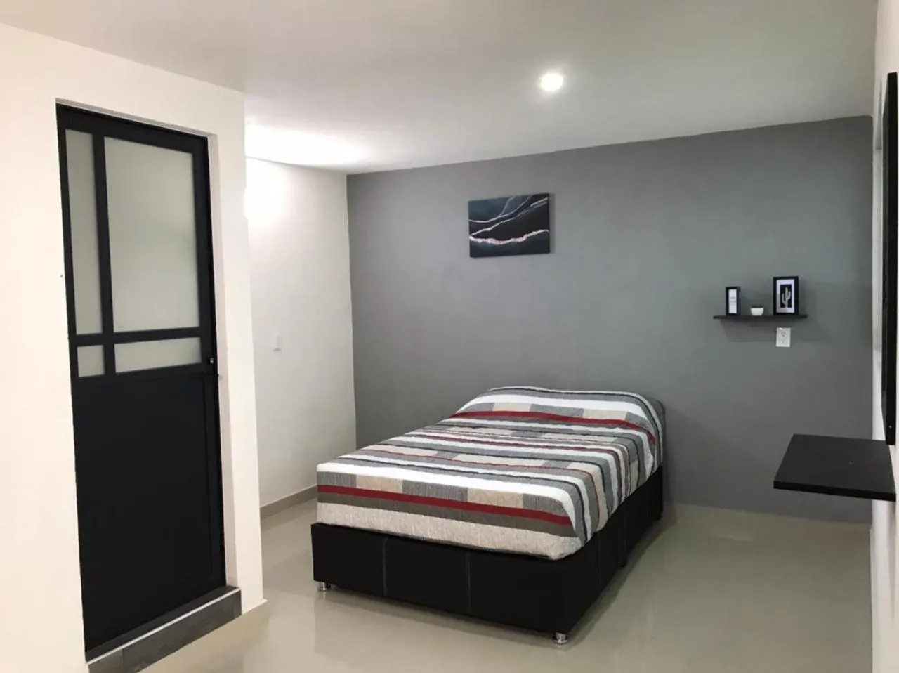 Bed in HOTEL NUEVA LUNA