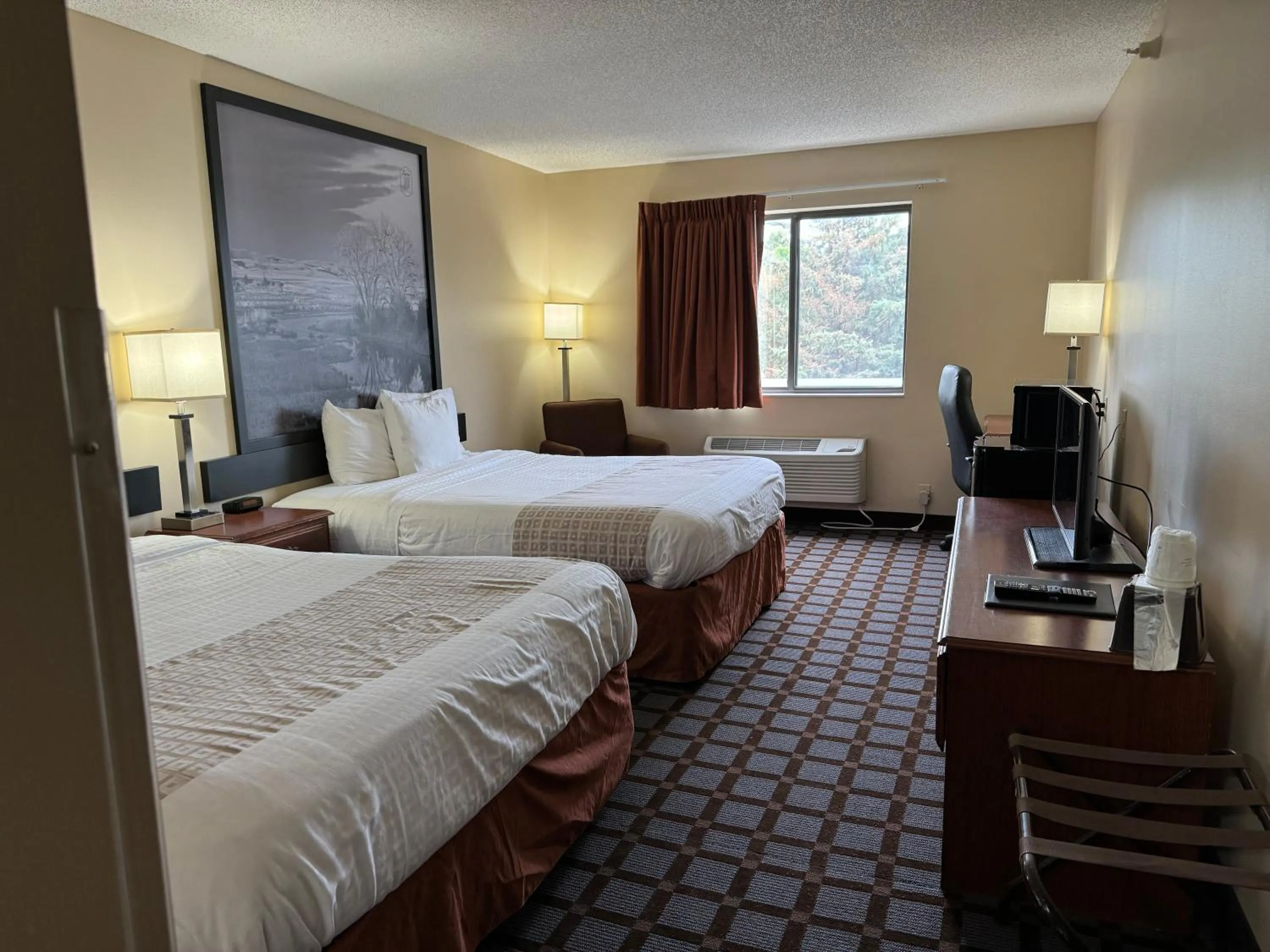 Bed in Super 8 by Wyndham Mason City