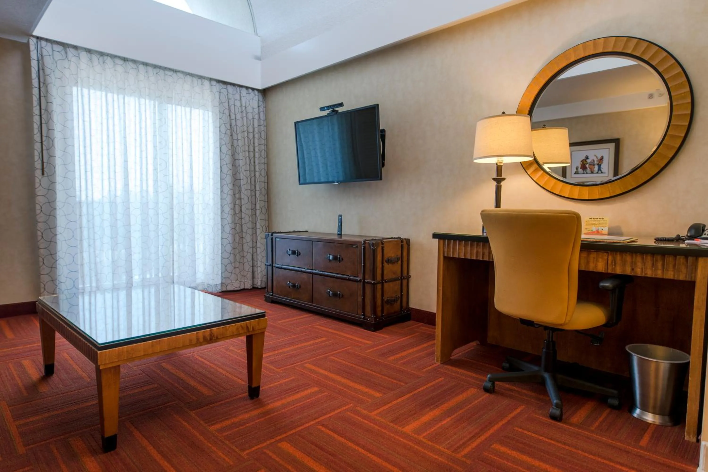 TV and multimedia in Howard Johnson by Wyndham Anaheim Hotel & Water Playground