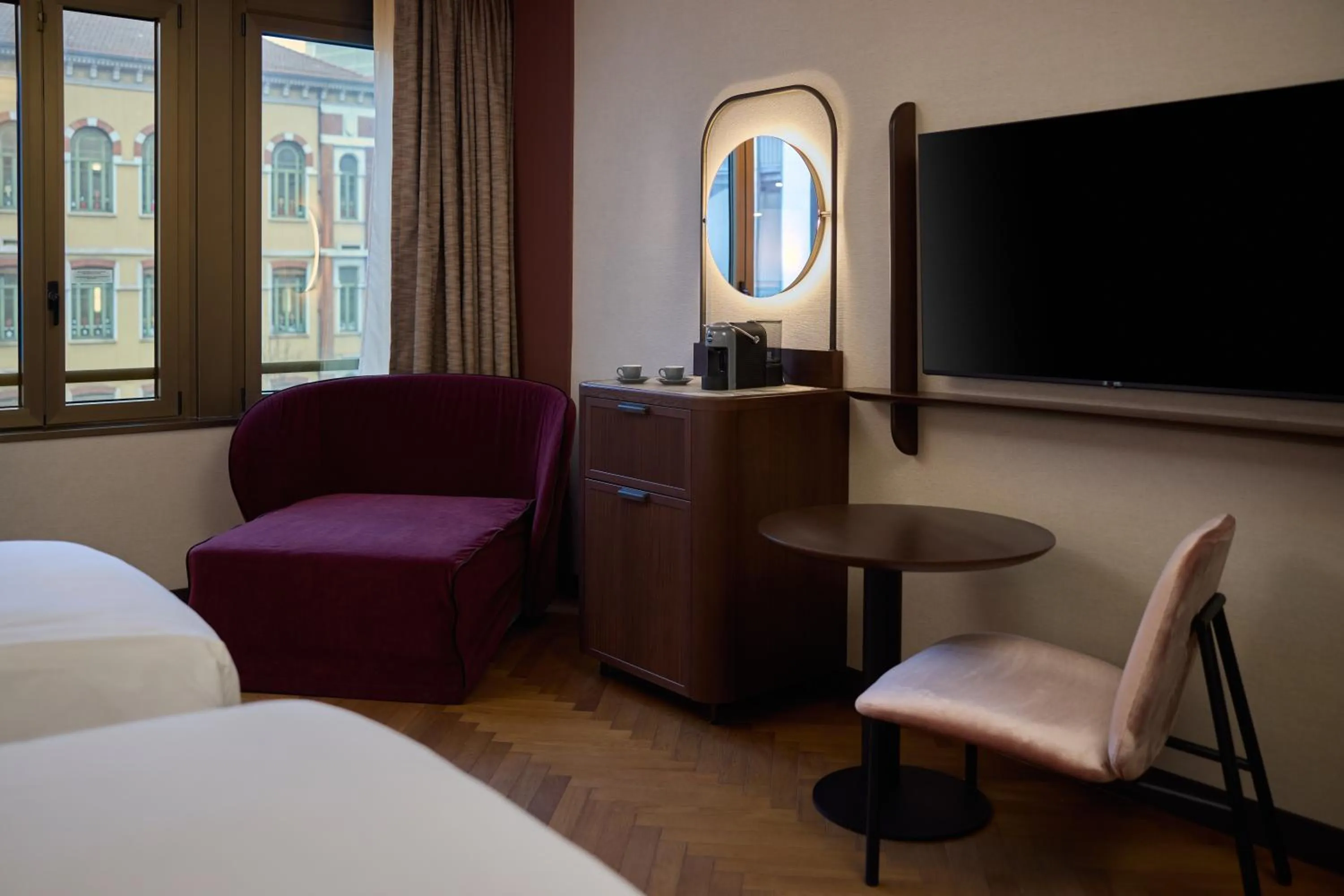 Seating area, Bed in Hilton Milan