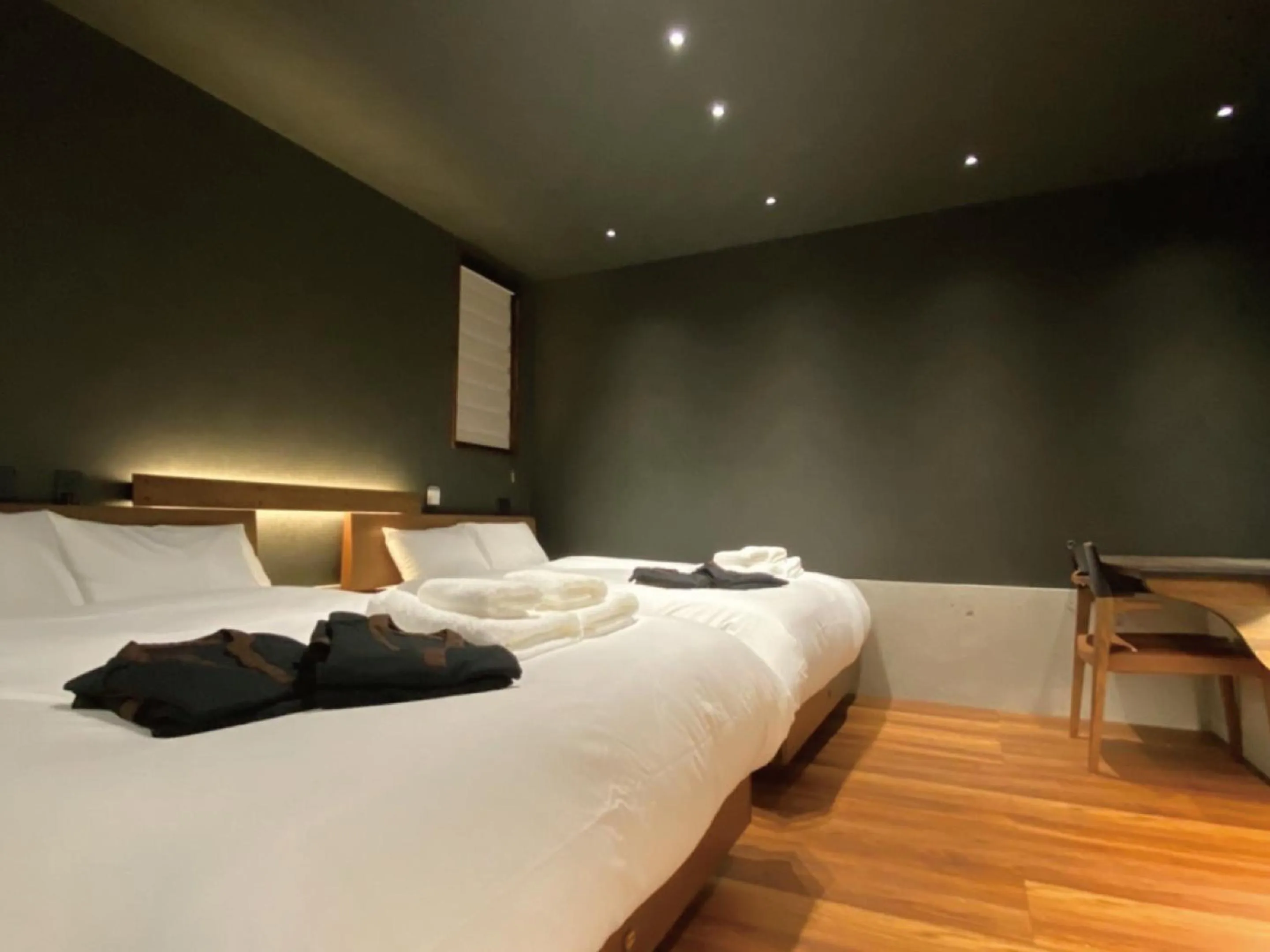 Bed in LAVA SAUNA &VILLA