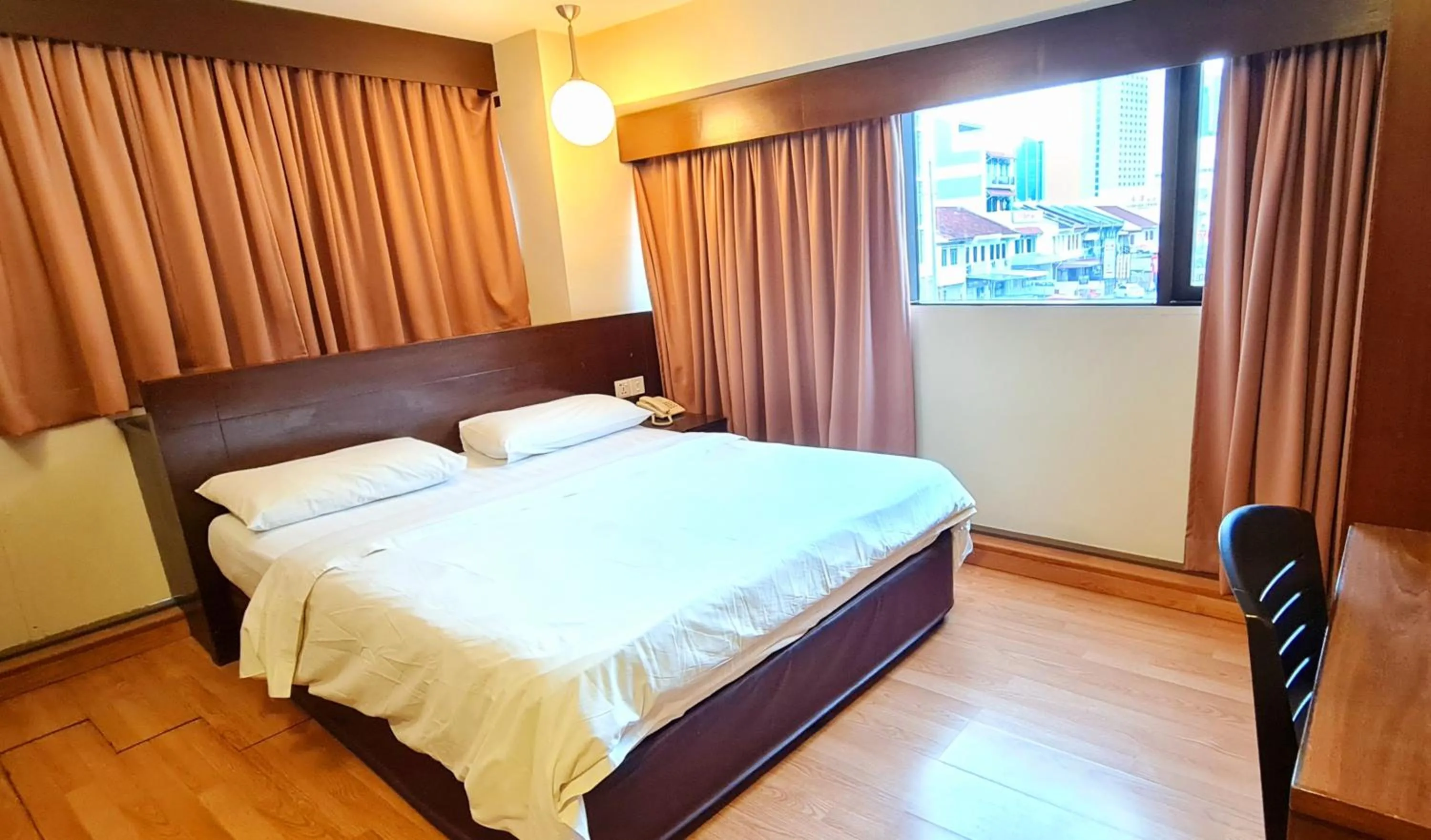 Bed in PP Hotel by Moxy