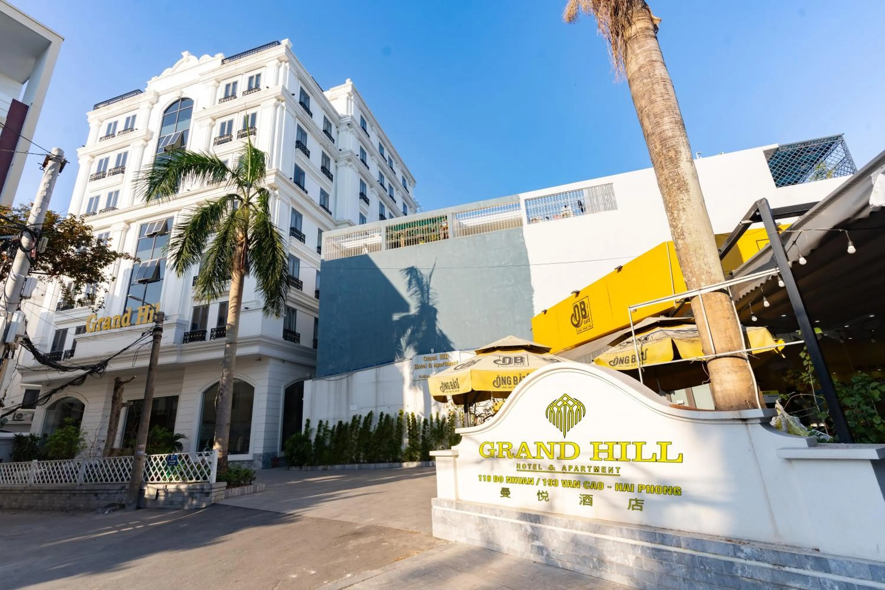 Property building in Grand Hill Hotel & Apartment