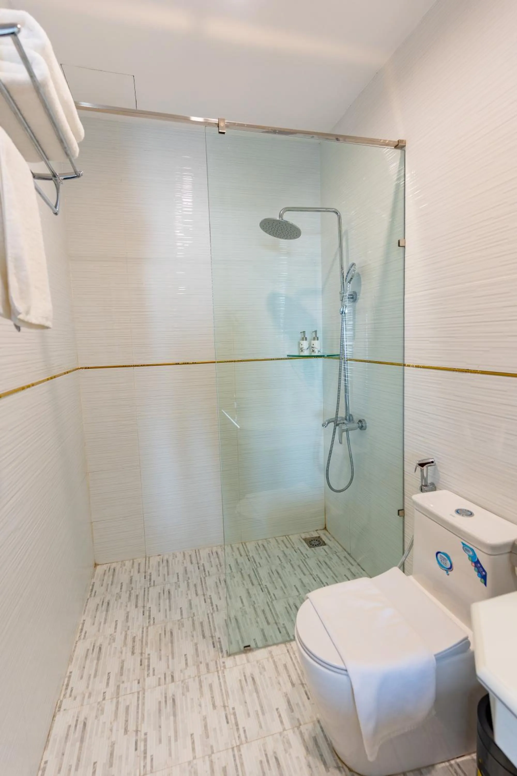 Toilet in Grand Hill Hotel & Apartment