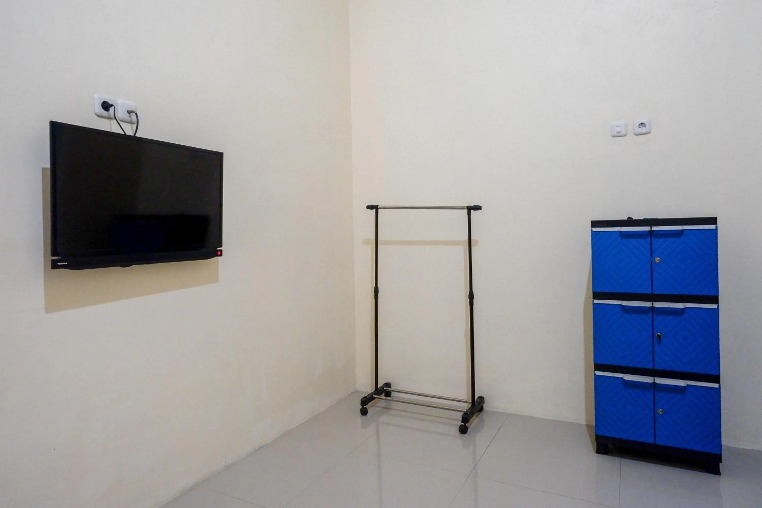 Bedroom in RedDoorz Syariah near Pasar Godong Grobogan