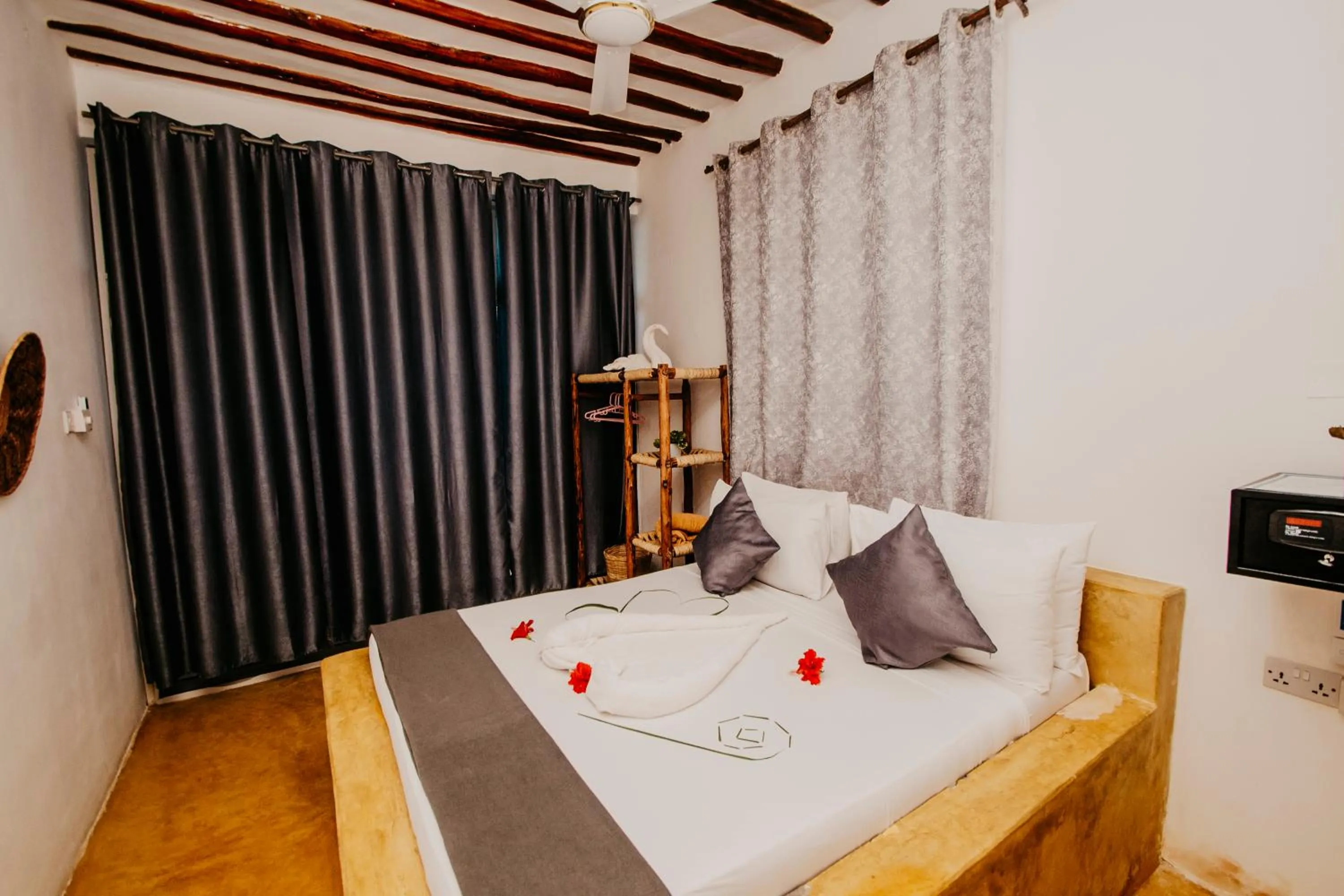 Bed in Equalia Rose Hotel