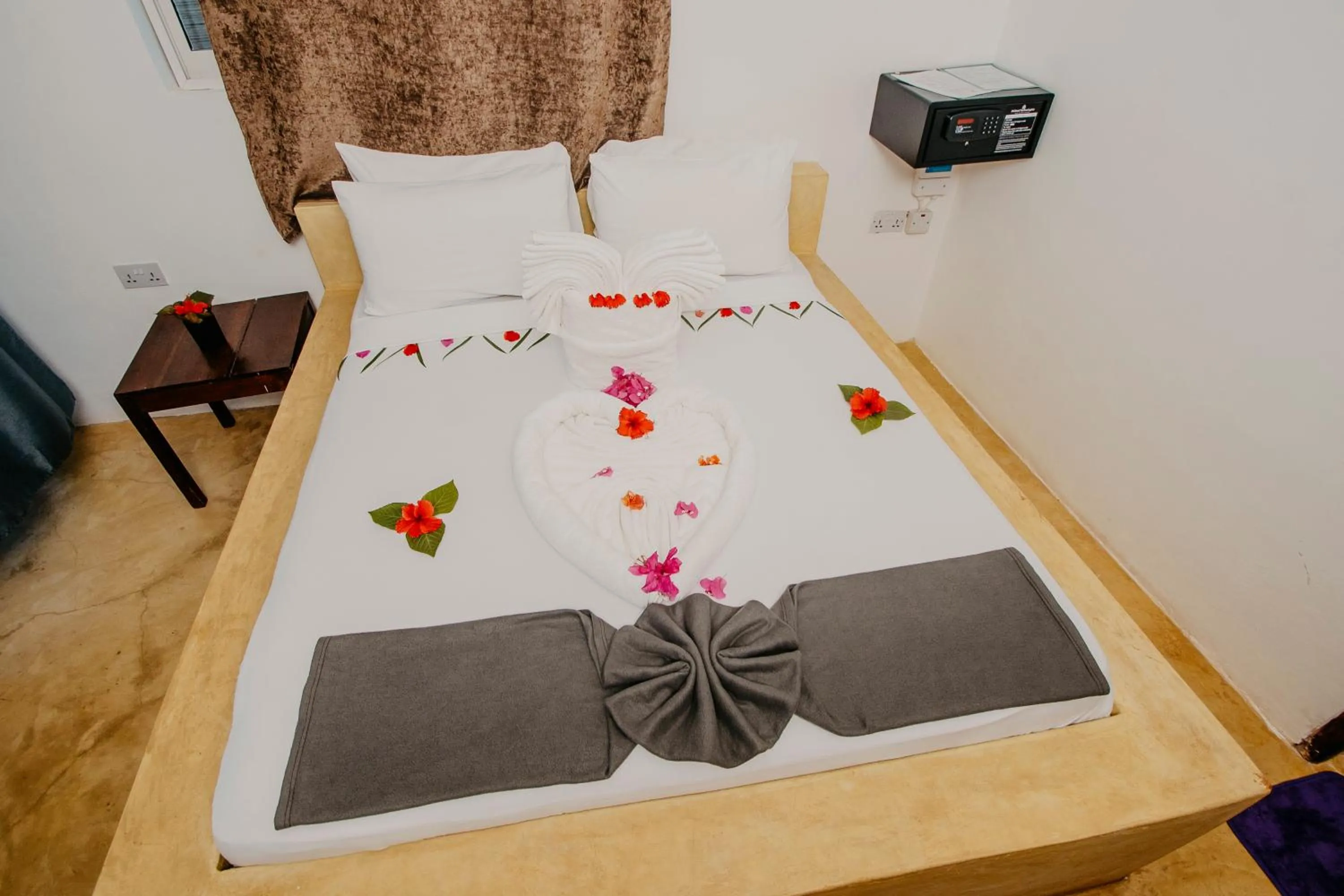 Bed in Equalia Rose Hotel