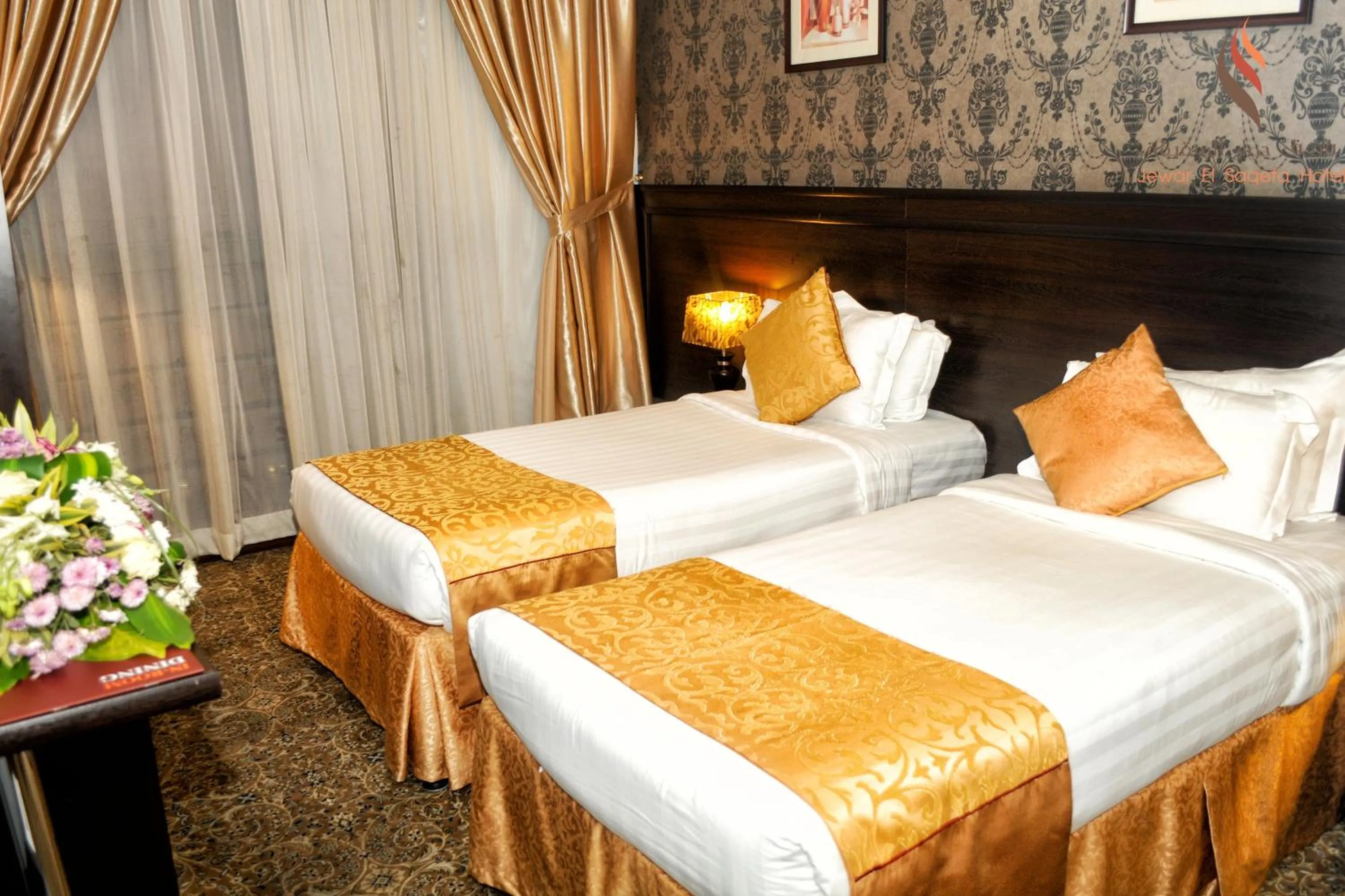Bed in Deyar Al Eiman Hotel