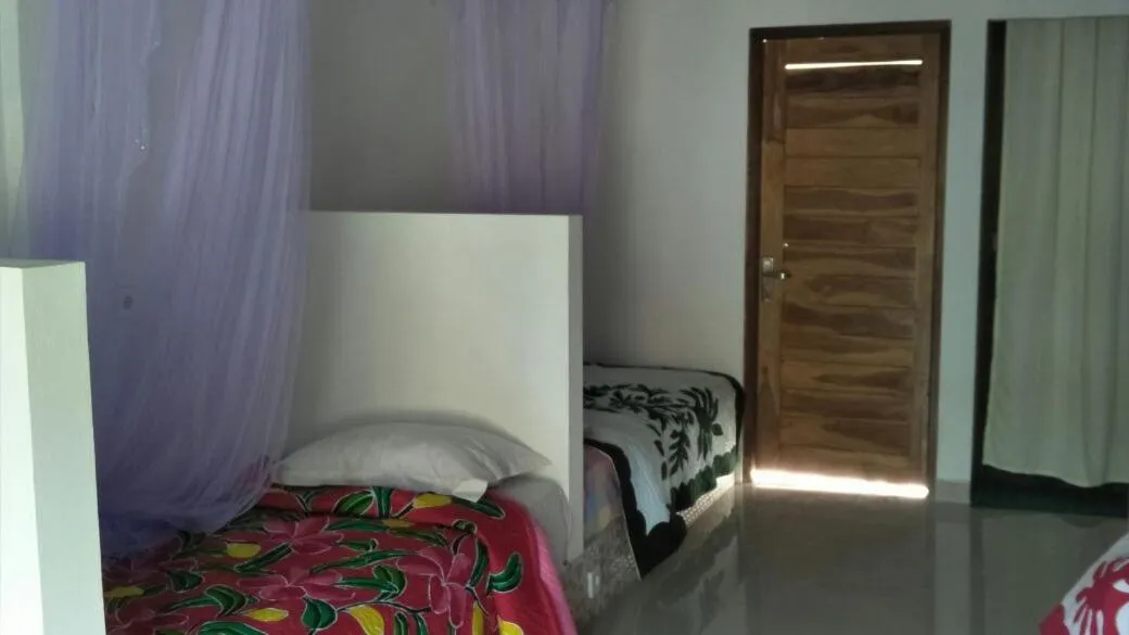 Bed in Bali Sari Homestay