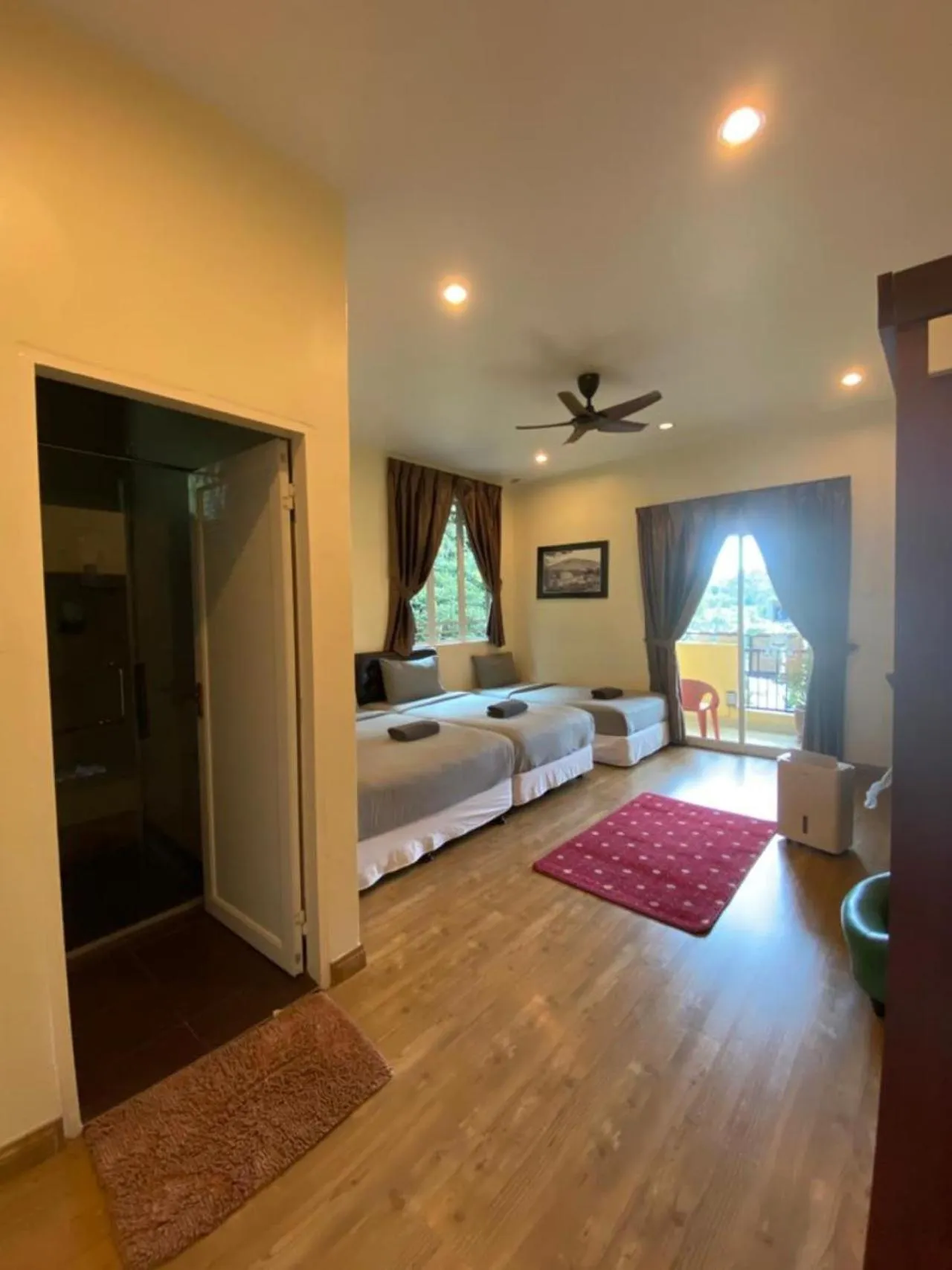 Bedroom in Highlanders Garden Guesthouse at Arundina Cameron Highlands